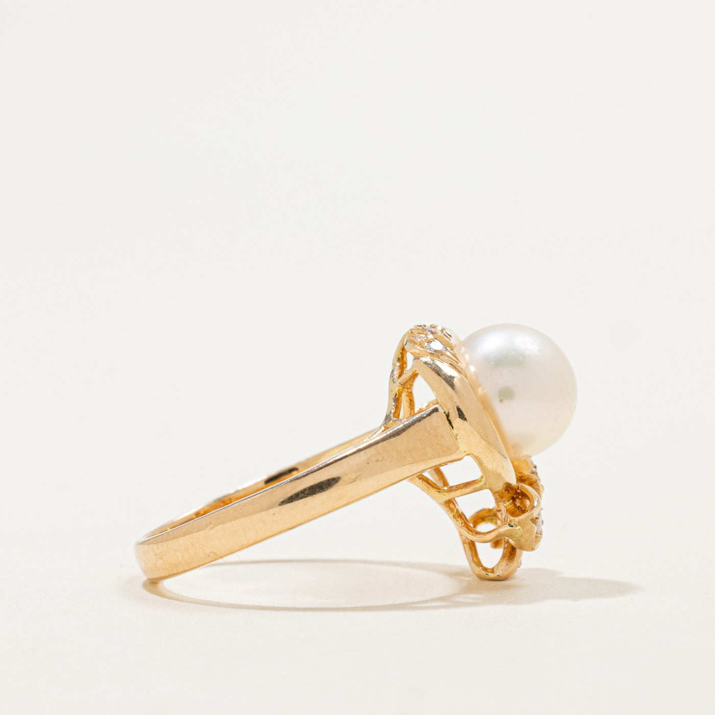 Bague nœud en or 14 carats, perles et diamants | 0,10 ct | Taille 6,5