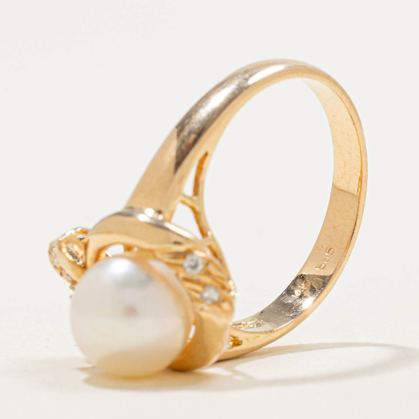 Bague nœud en or 14 carats, perles et diamants | 0,10 ct | Taille 6,5