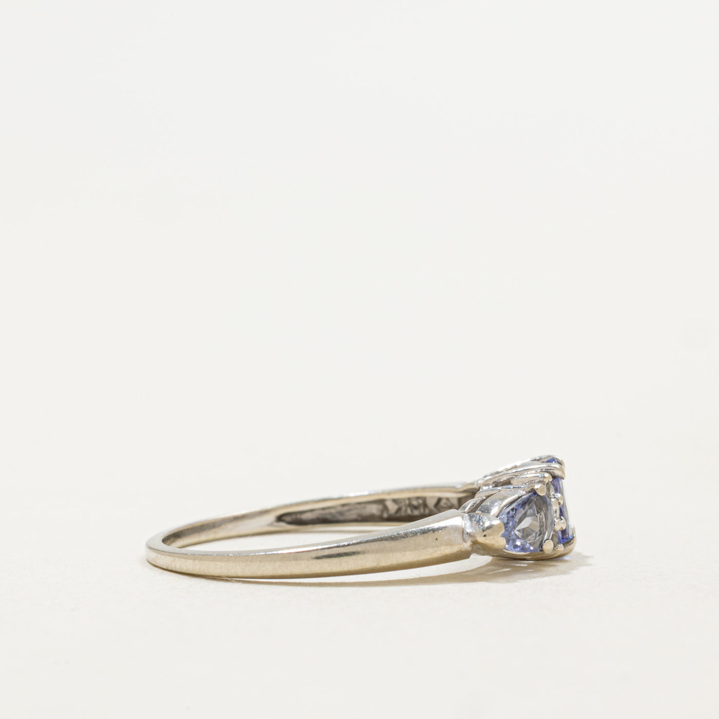 10K Three Stone Tanzanite & Diamond Accented Ring | 0.75ctw, 0.03ctw | SZ 6.75