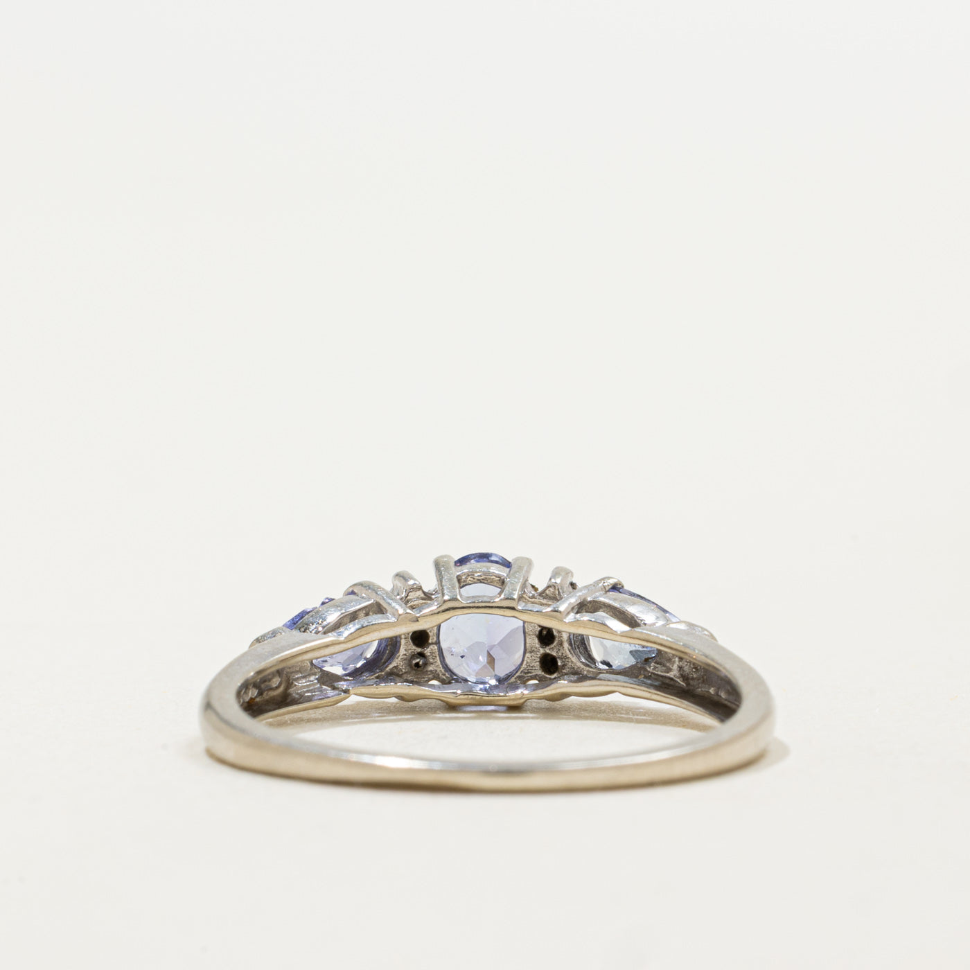 10K Three Stone Tanzanite & Diamond Accented Ring | 0.75ctw, 0.03ctw | SZ 6.75