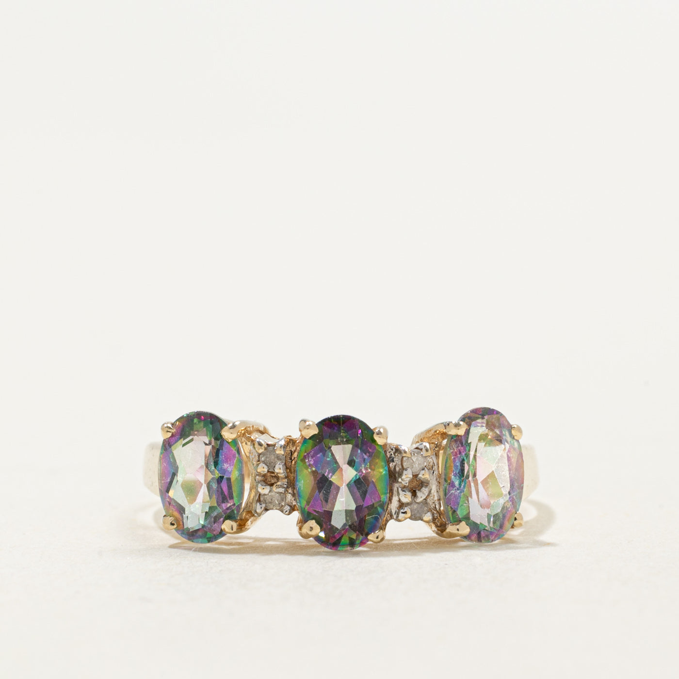10K Three Stone Oval Cut Mystic Topaz & Diamond Ring | 1.50ctw, 0.03ctw | SZ 6.5