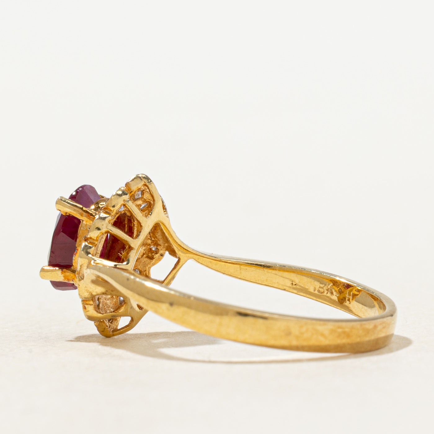 Oval Cut Ruby & Diamond Petal Halo Ring | 0.70ct, 0.06ctw | SZ 5.5