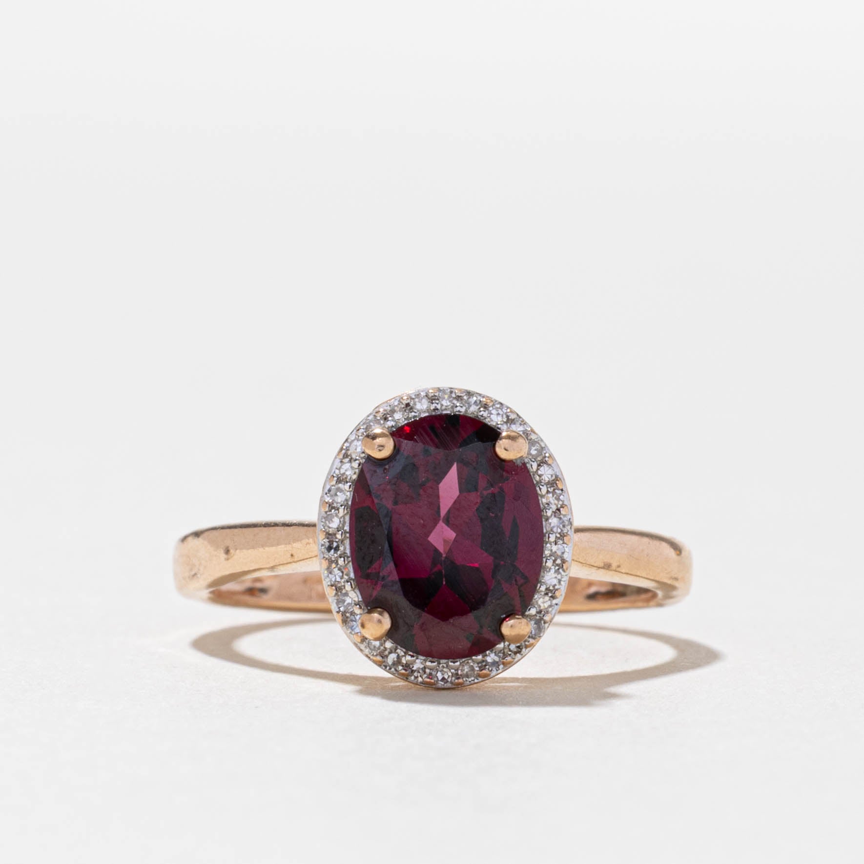 10k Oval Cut Garnet & Diamond Halo Ring | 1.90ct, 0.08ctw | SZ 6.5