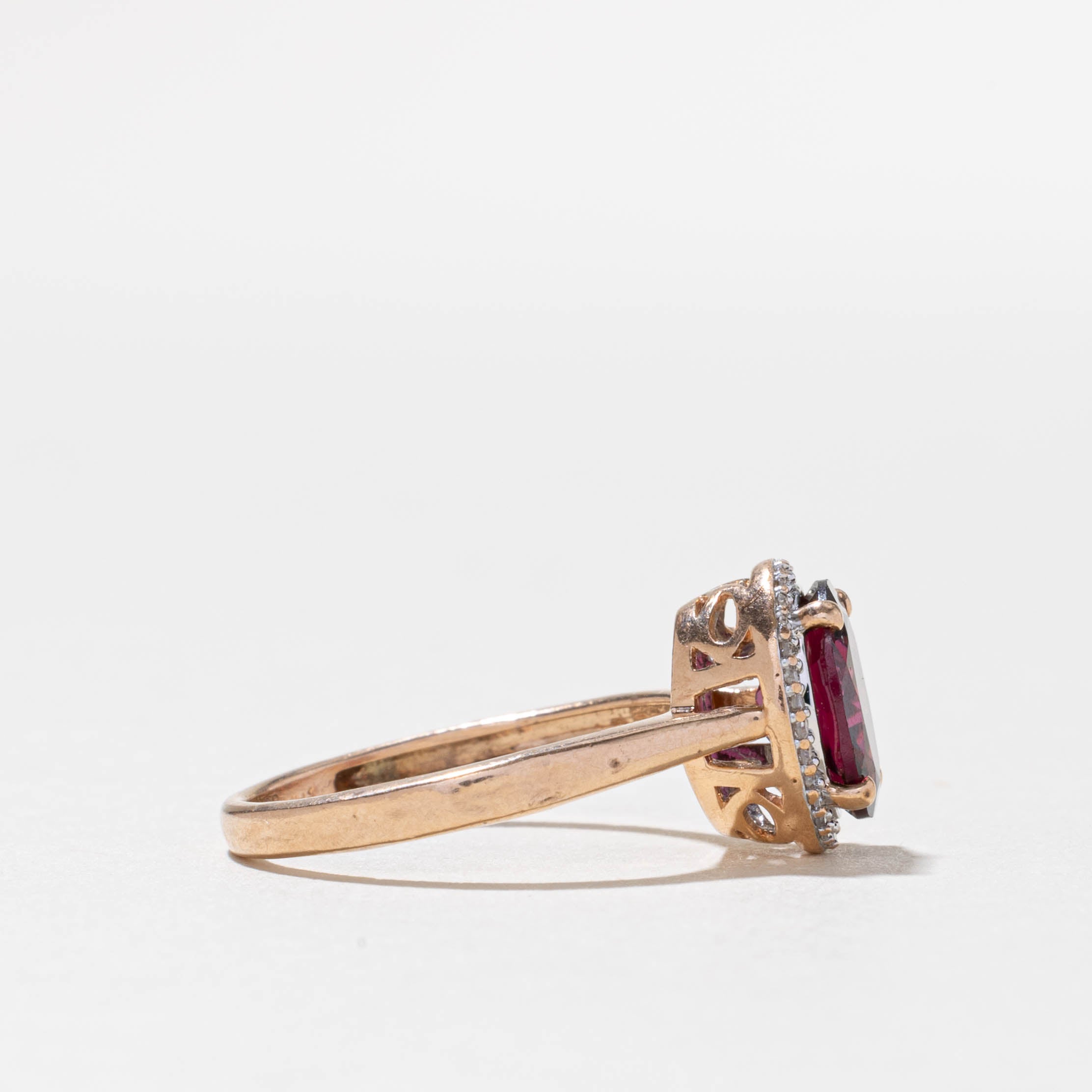 10k Oval Cut Garnet & Diamond Halo Ring | 1.90ct, 0.08ctw | SZ 6.5