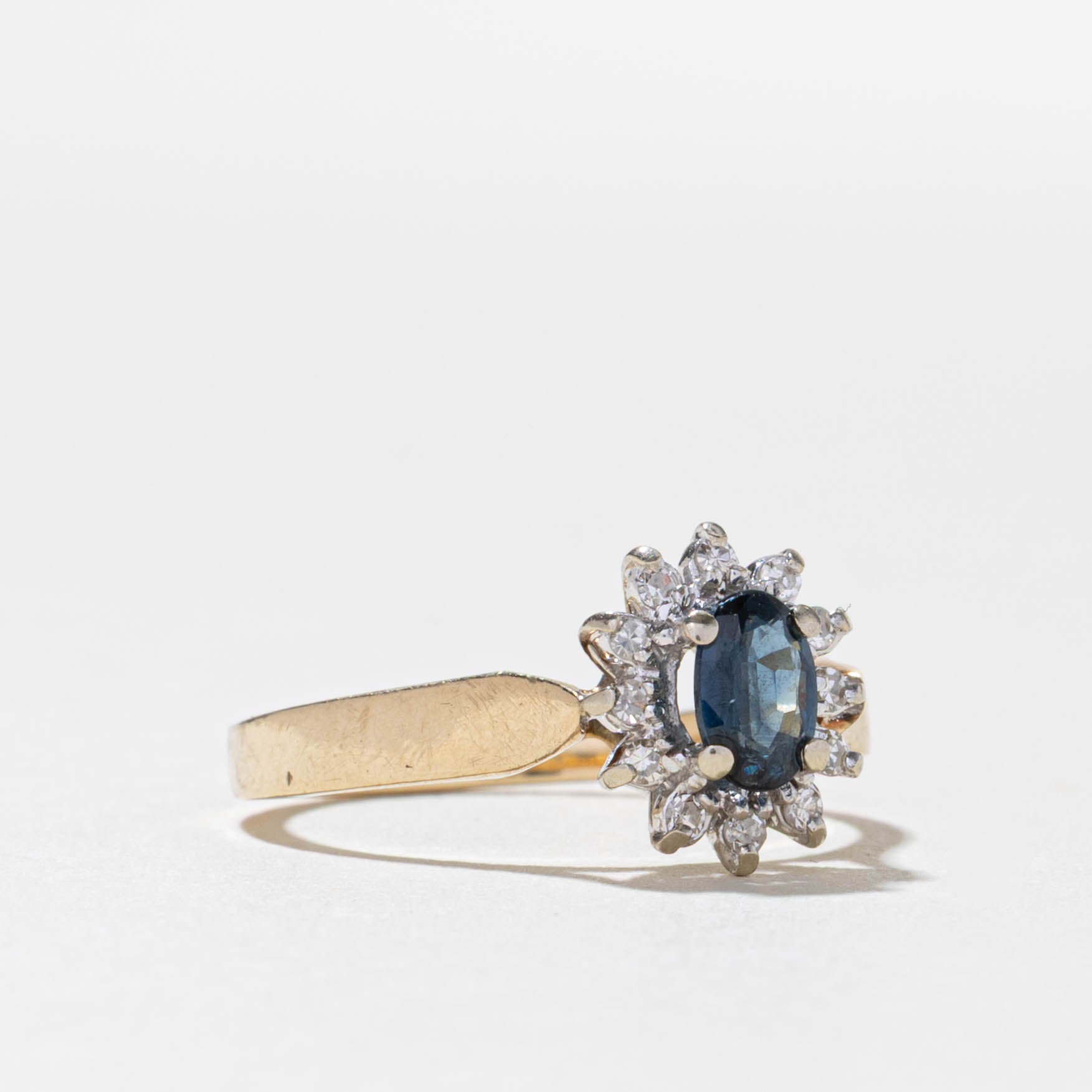 10k Oval Cut Sapphire & Diamond Petal Halo Ring | 0.31ct, 0.06ctw | SZ 7
