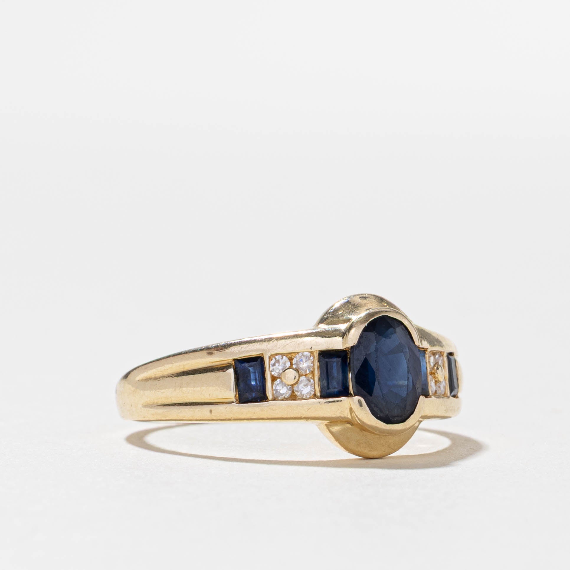 10k Semi Bezel Sapphire & Diamond Ring | 0.95ctw, 0.04ctw | SZ 9.5