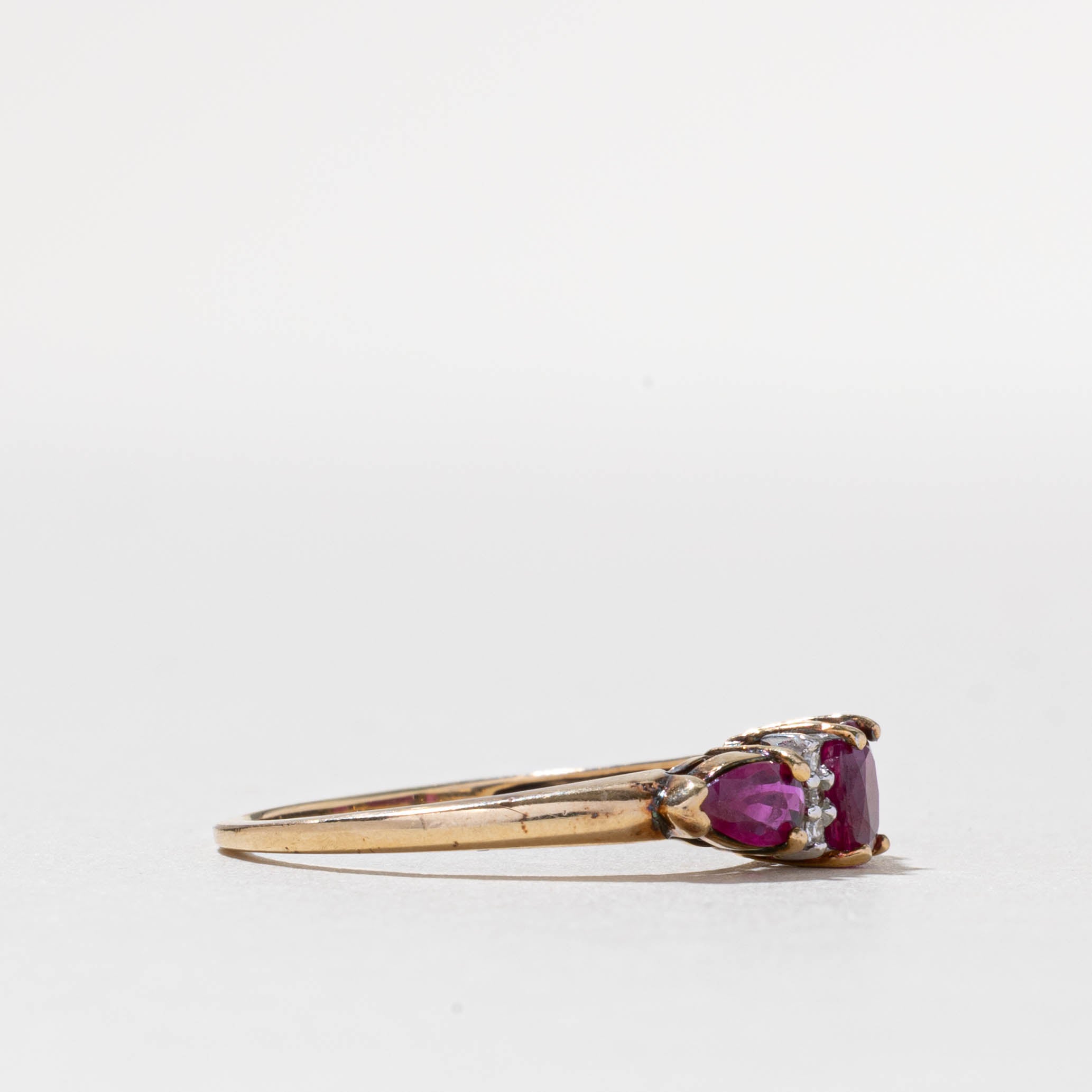 10k Three Stone Ruby & Diamond Accented Ring | 0.80ctw, 0.03ctw | SZ 8