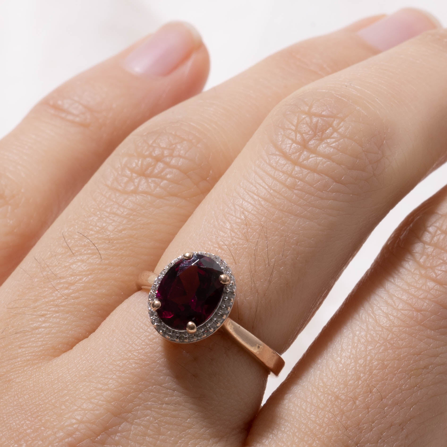 10k Oval Cut Garnet & Diamond Halo Ring | 1.90ct, 0.08ctw | SZ 6.5