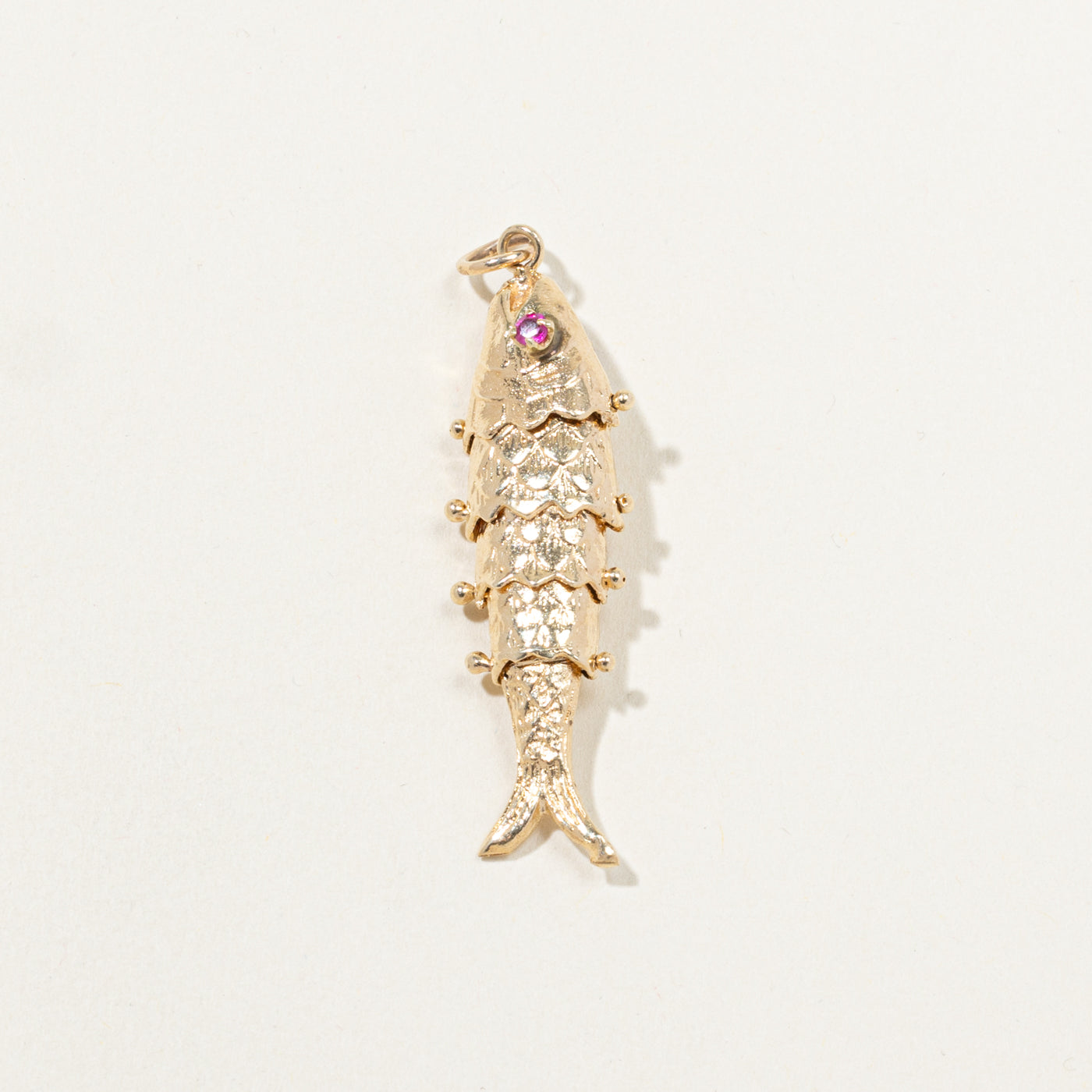 10k Synthetic Ruby Articulated Fish Pendant | 0.10ctw