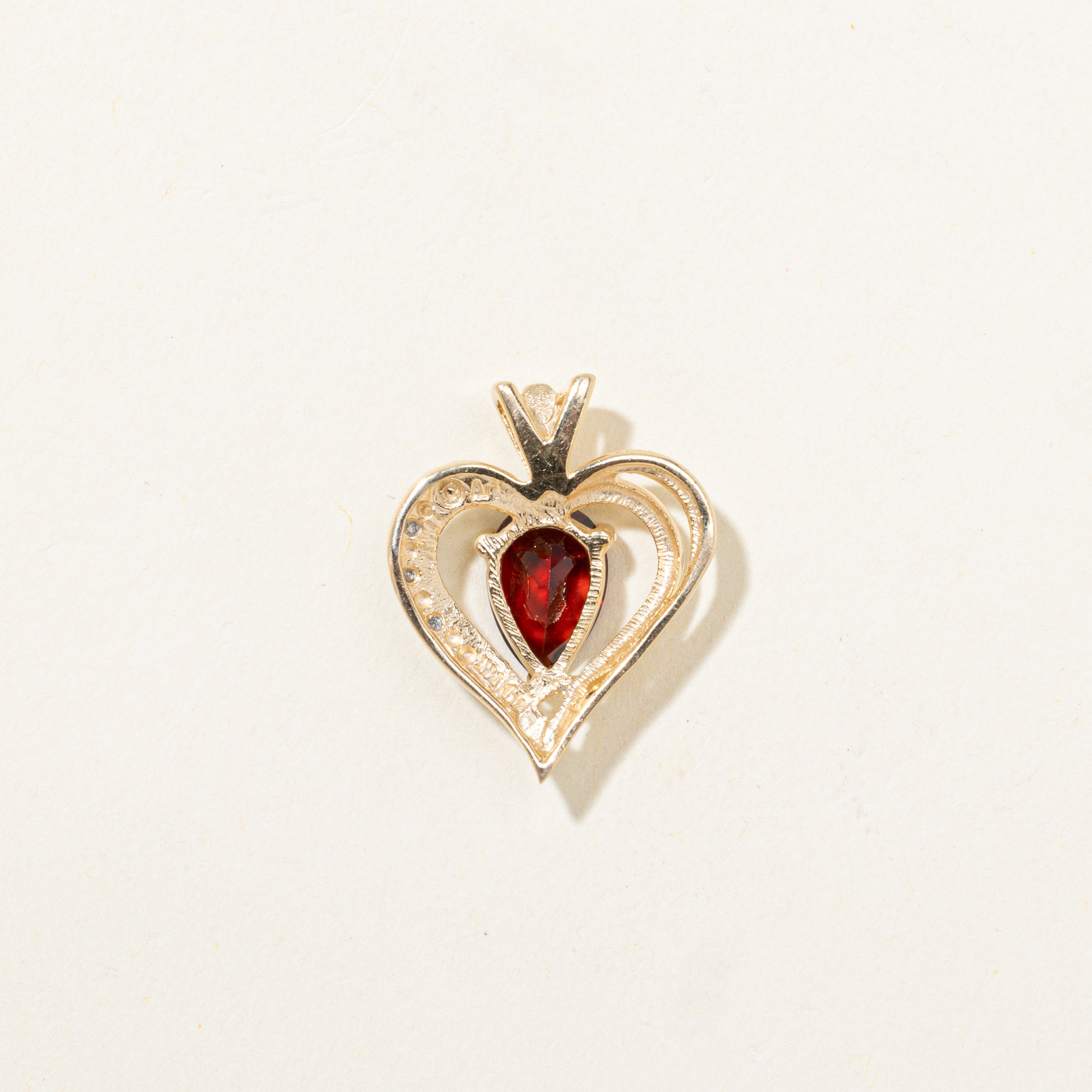Pear Cut Garnet & Diamond Open Heart Pendant | 1.50ct, 0.006ctw