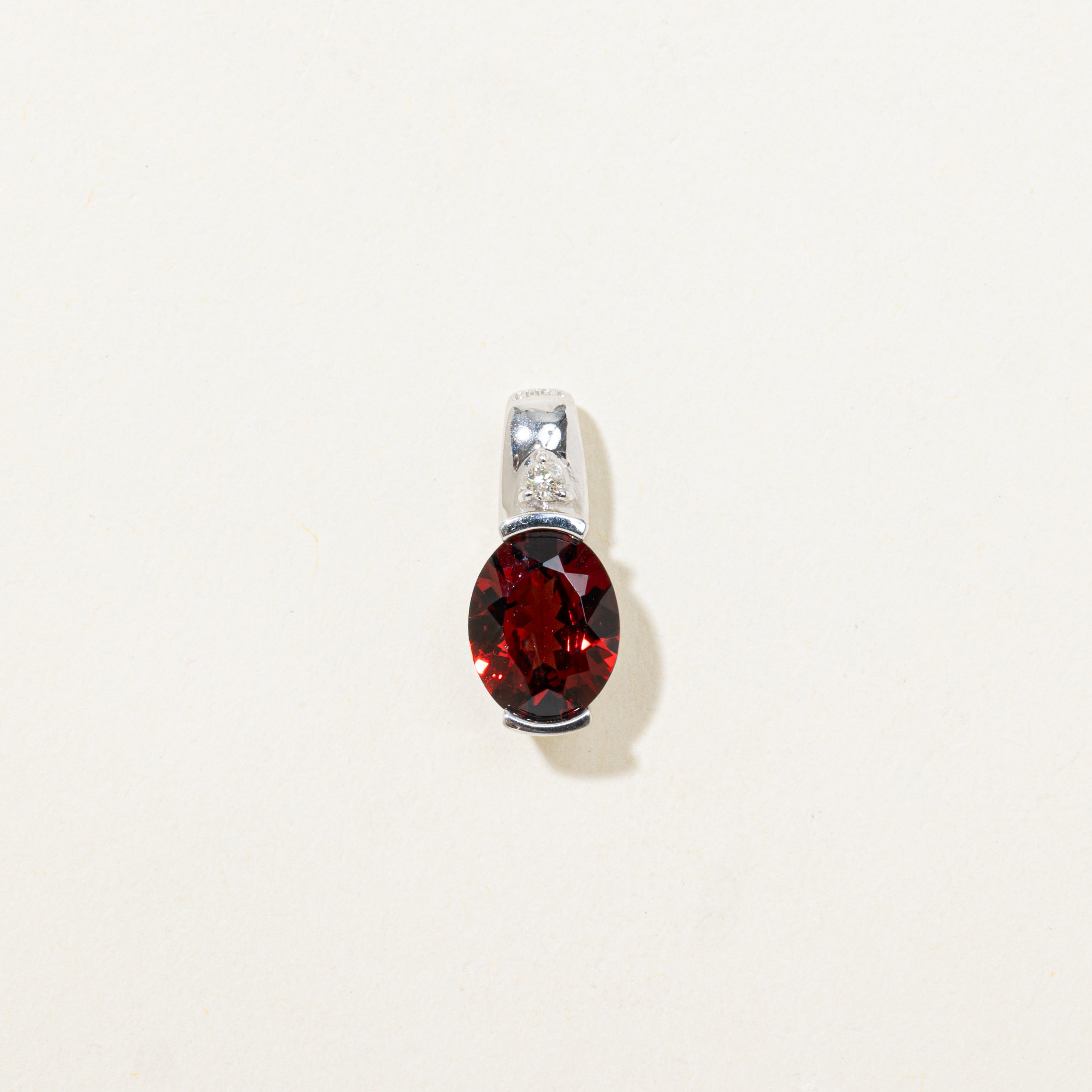 Oval Cut Garnet & Diamond Pendant | 1.78ct, 0.02ct