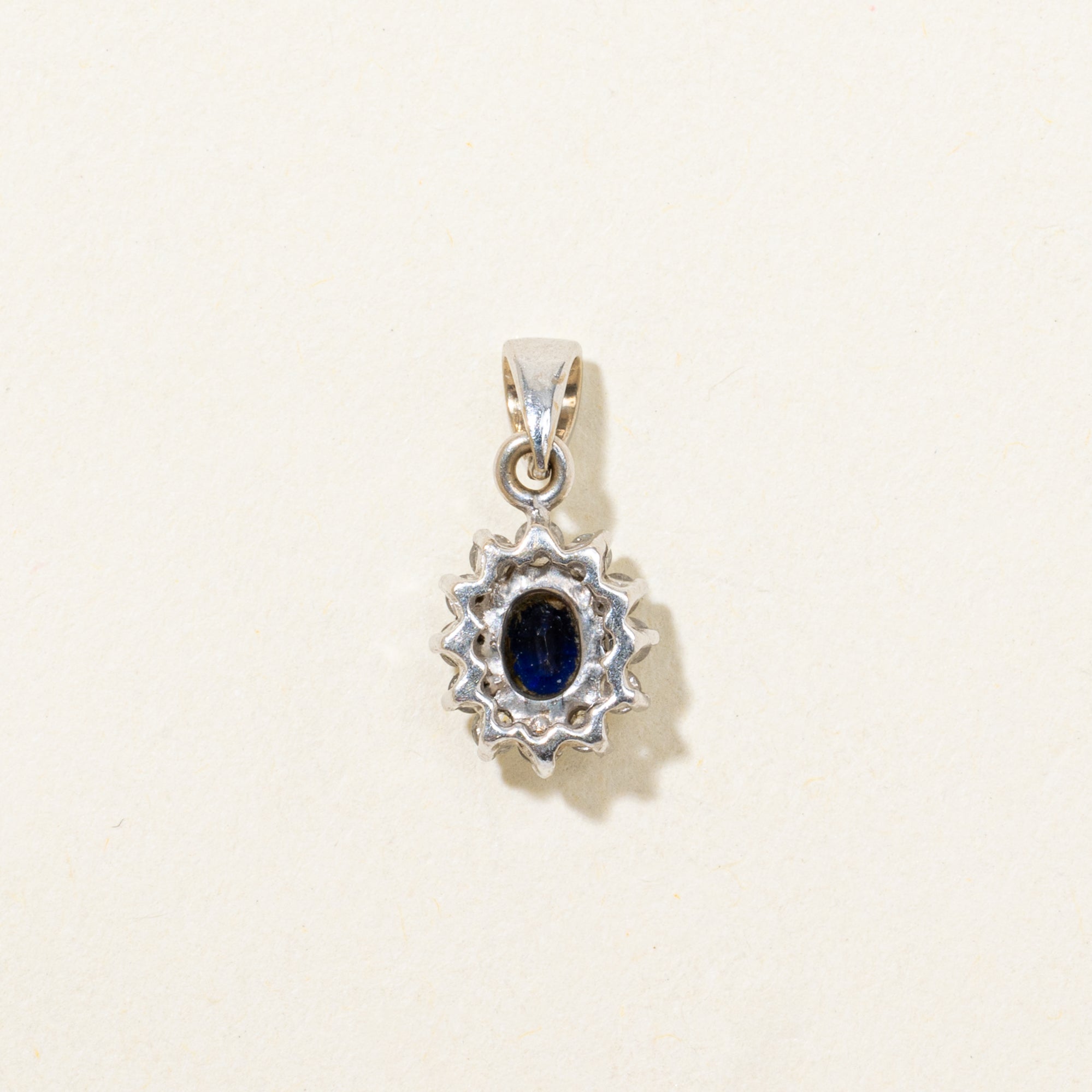 18k Oval Cut Sapphire & Diamond Petal Halo Pendant | 0.48ct, 0.09ctw