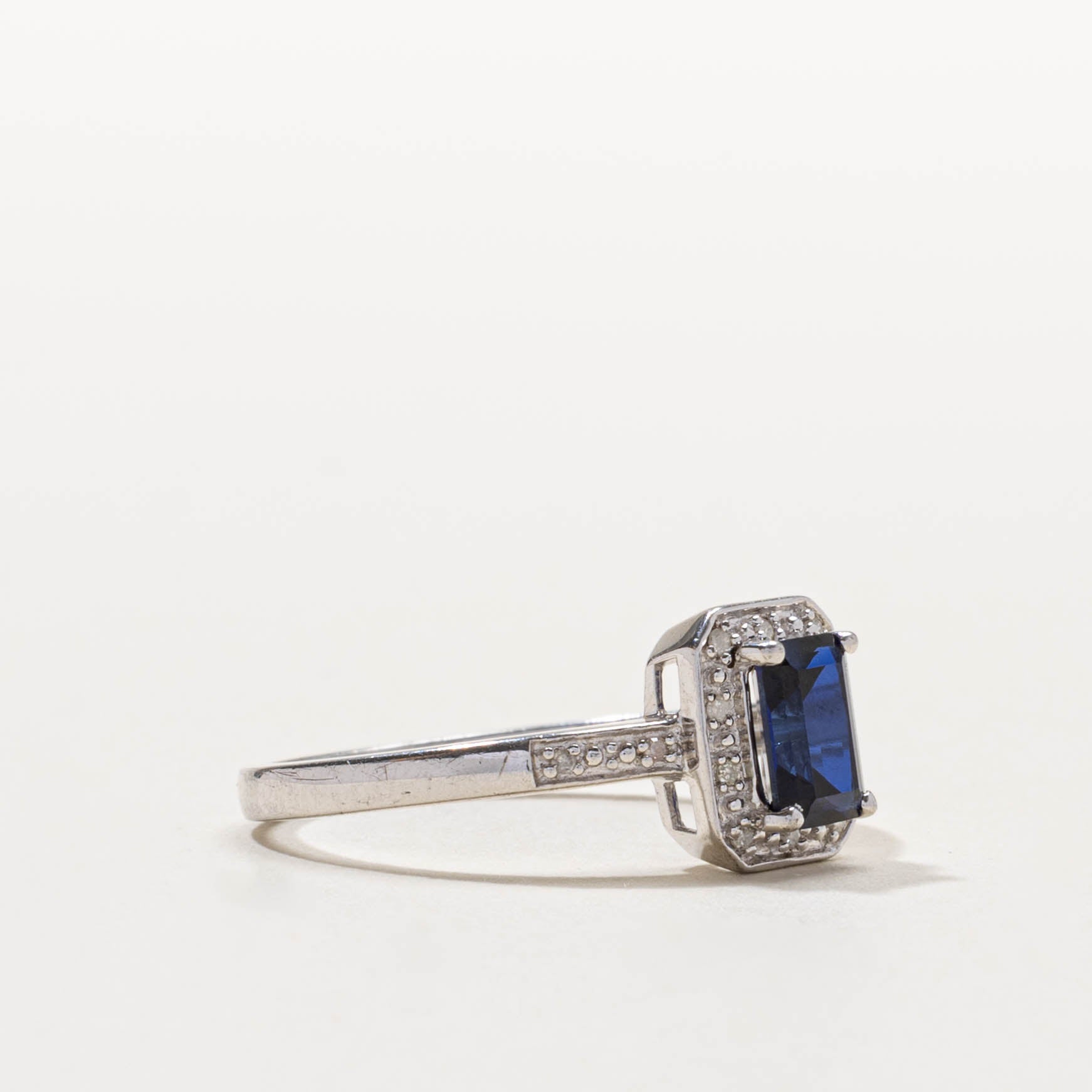 Sterling Silver Synthetic Sapphire & Natural Diamond Halo Ring | 1.00ct, 0.03ctw | SZ 9.75