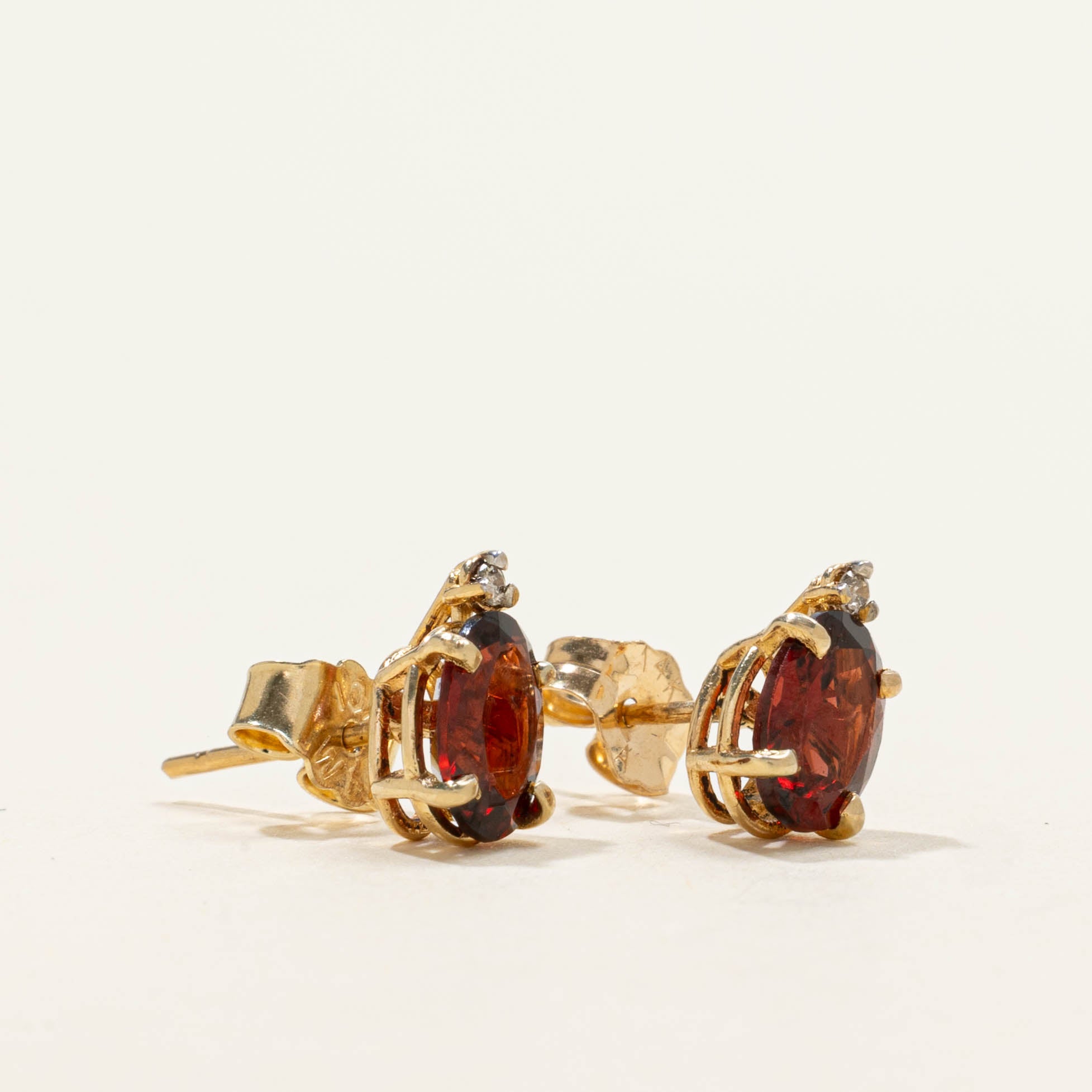 14k Garnet & Diamond Stud Earrings | 1.60ctw, 0.01ctw