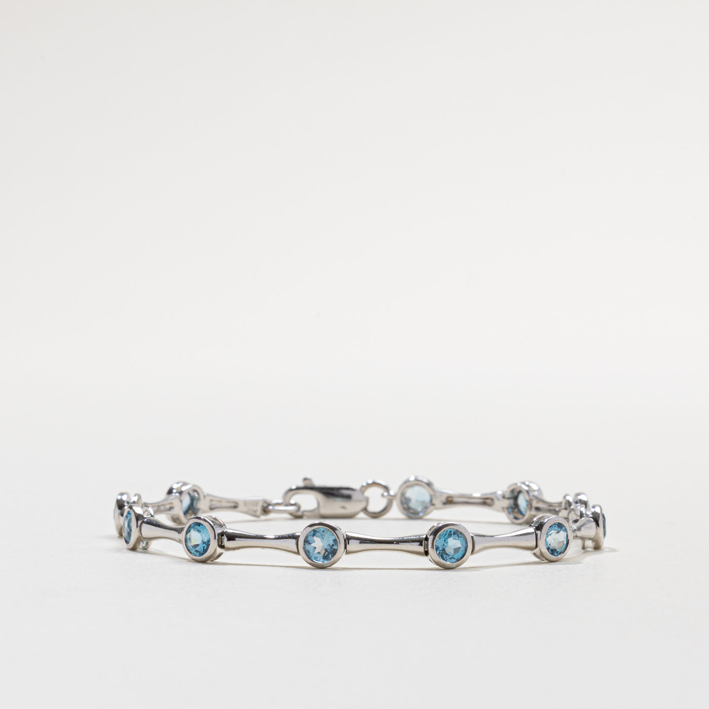 14k Bezel Set Blue Topaz Bracelet | 3.30ctw