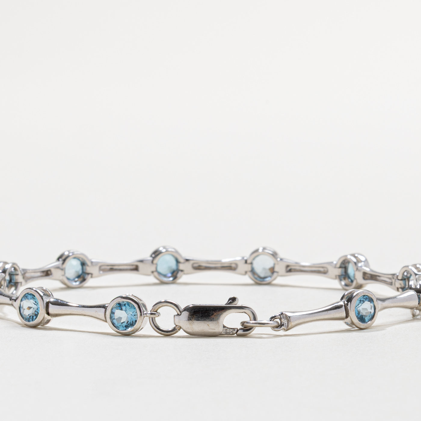 14k Bezel Set Blue Topaz Bracelet | 3.30ctw