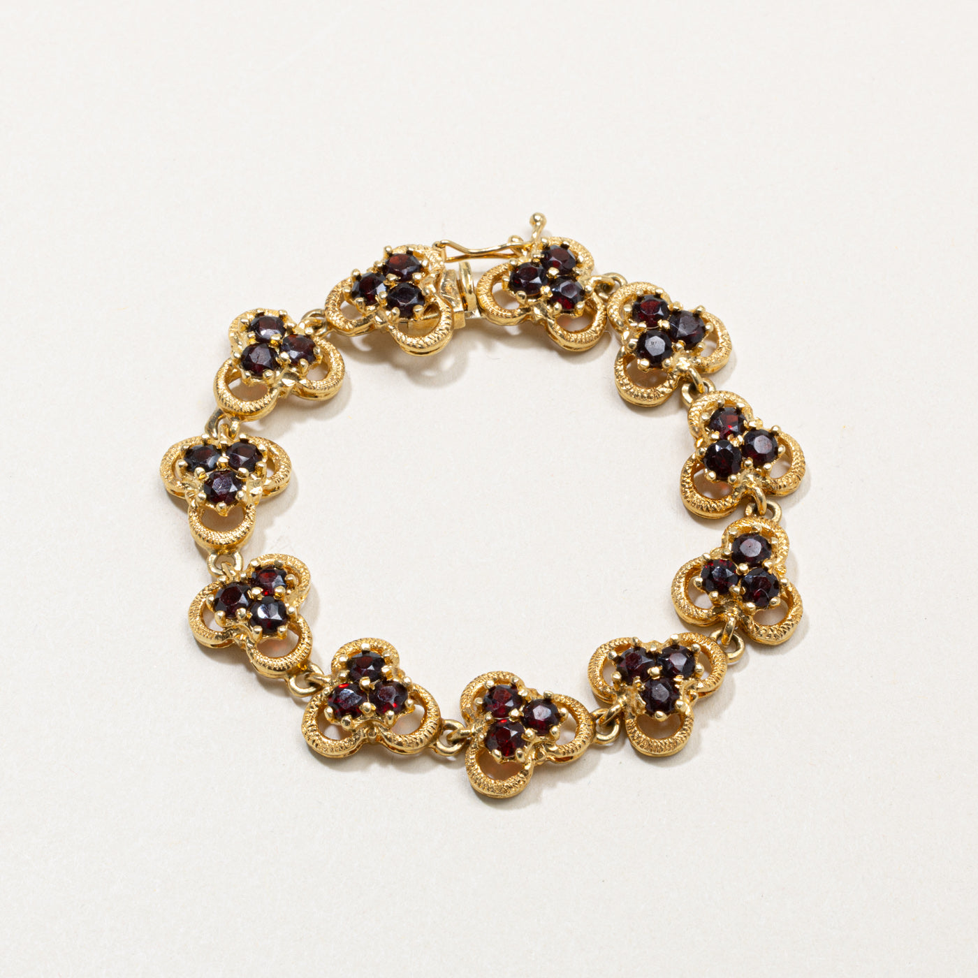 18k Garnet Floral Cluster Bracelet | 6.60ctw