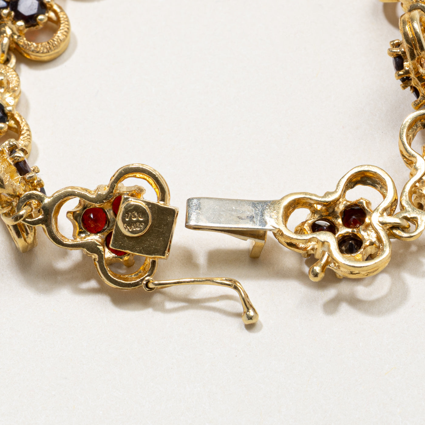 18k Garnet Floral Cluster Bracelet | 6.60ctw