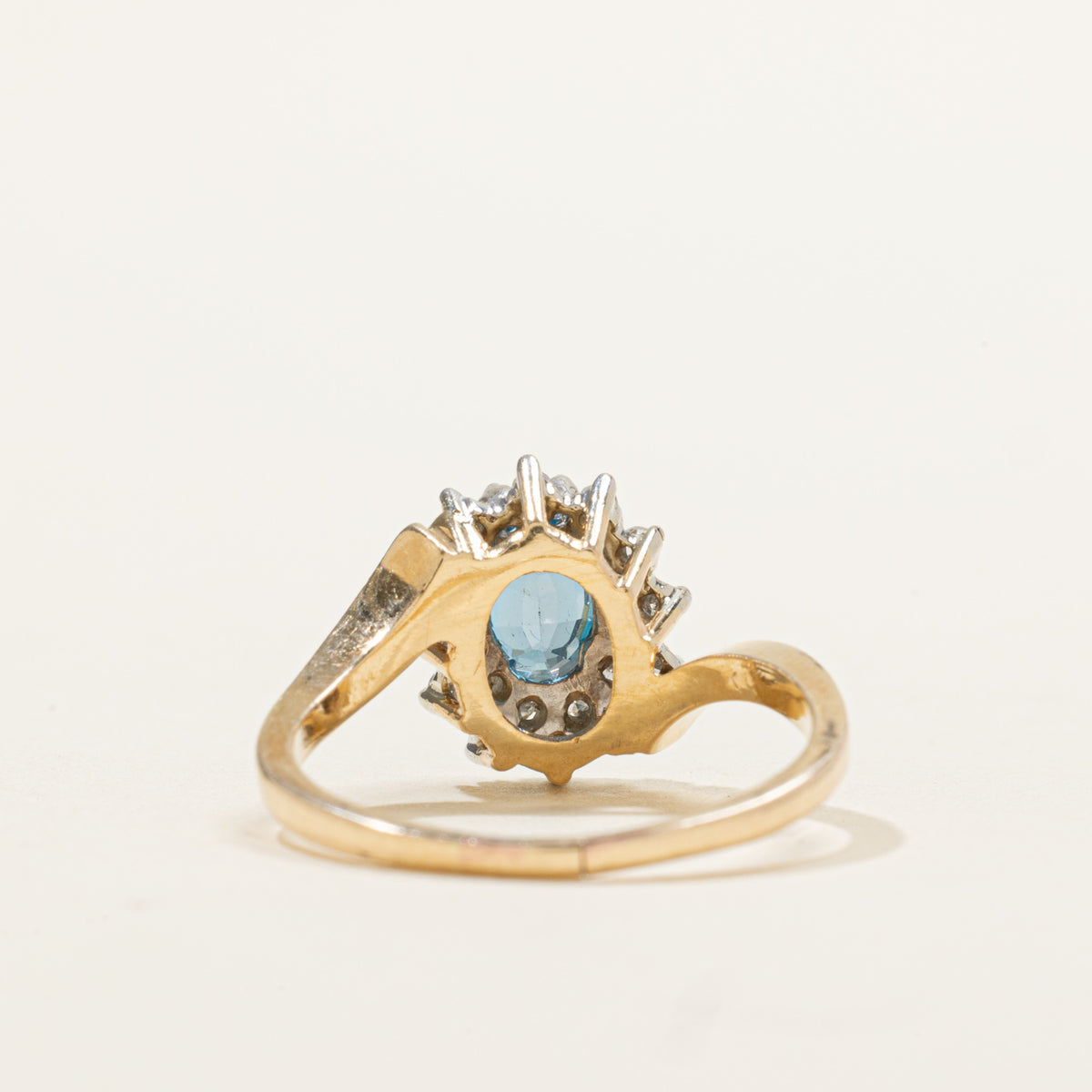 14k Oval Cut Blue Topaz & Diamond Petal Halo Bypass Ring | 0.95ct, 0.18ctw | SZ 8.25