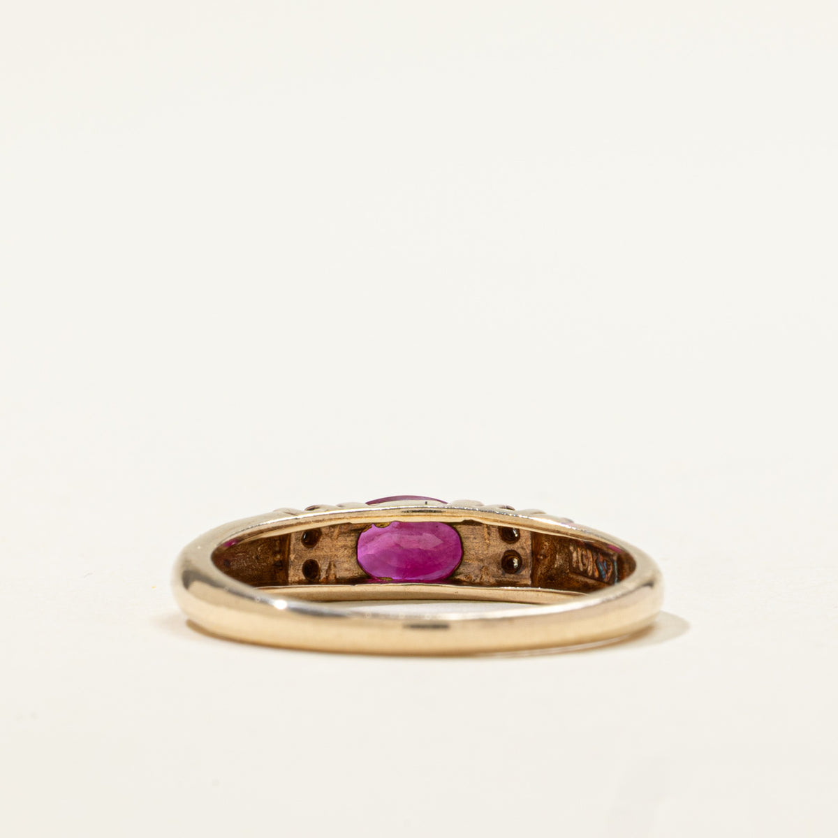 10k East West Oval Cut Ruby & Diamond Accented Ring | 0.50ct, 0.02ctw | SZ 6.75