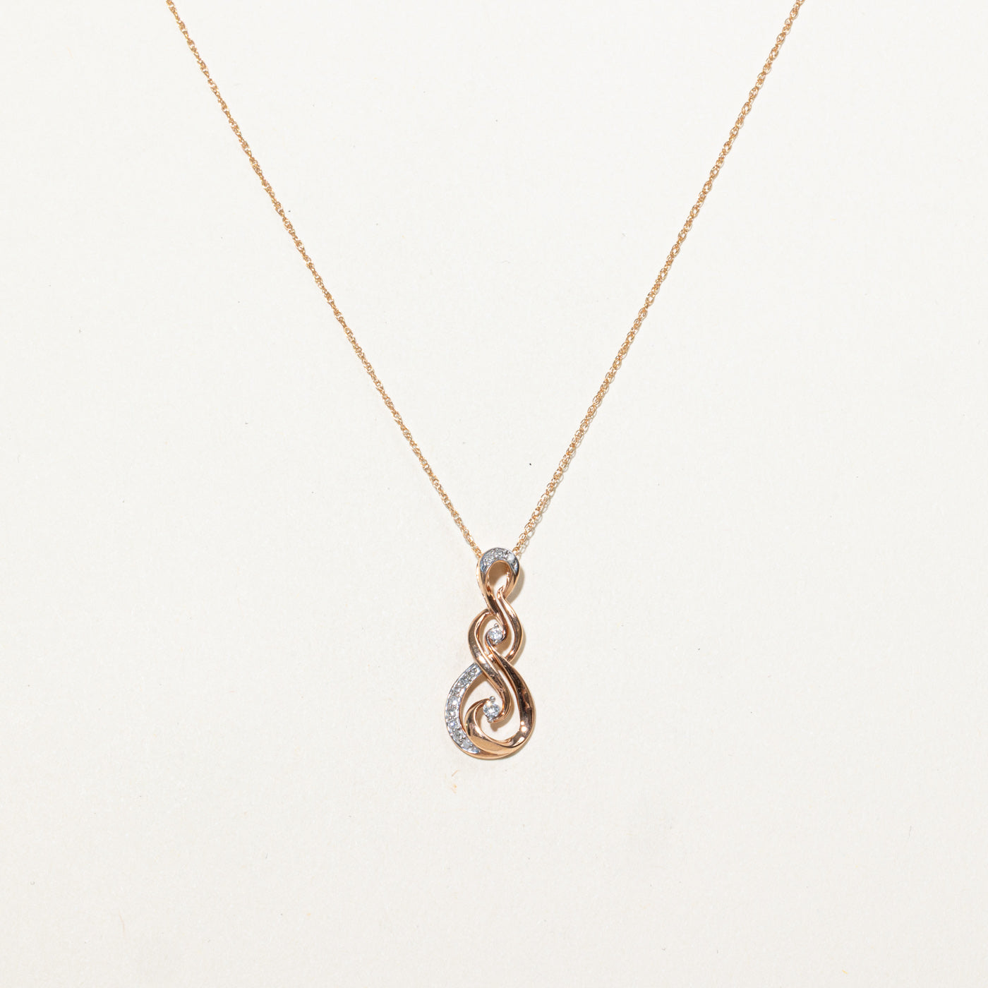 10K Rose Gold Diamond Swirl Pendant Necklace | 20"