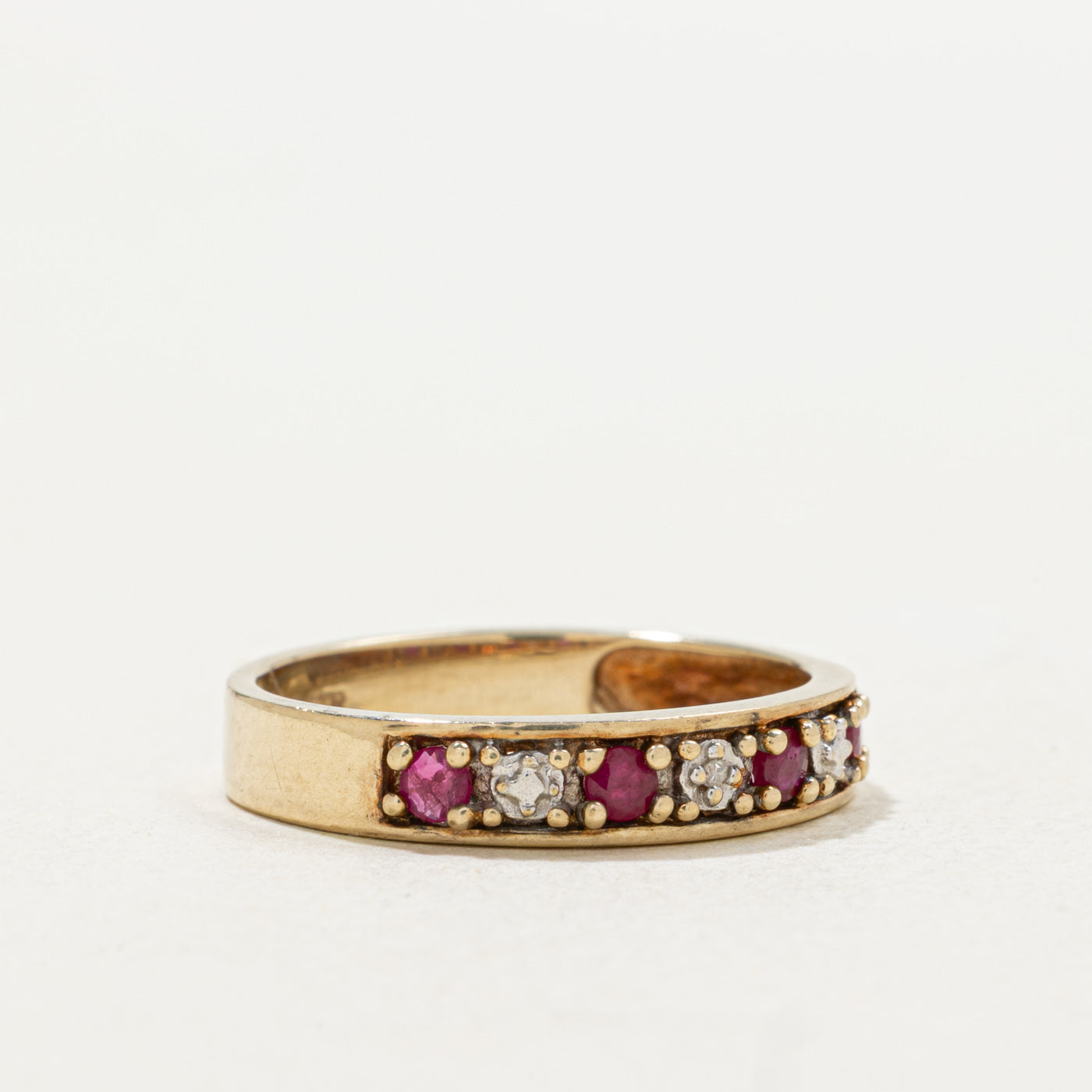 10k Seven Stone Round Cut Ruby & Diamond Band | SZ 7.0