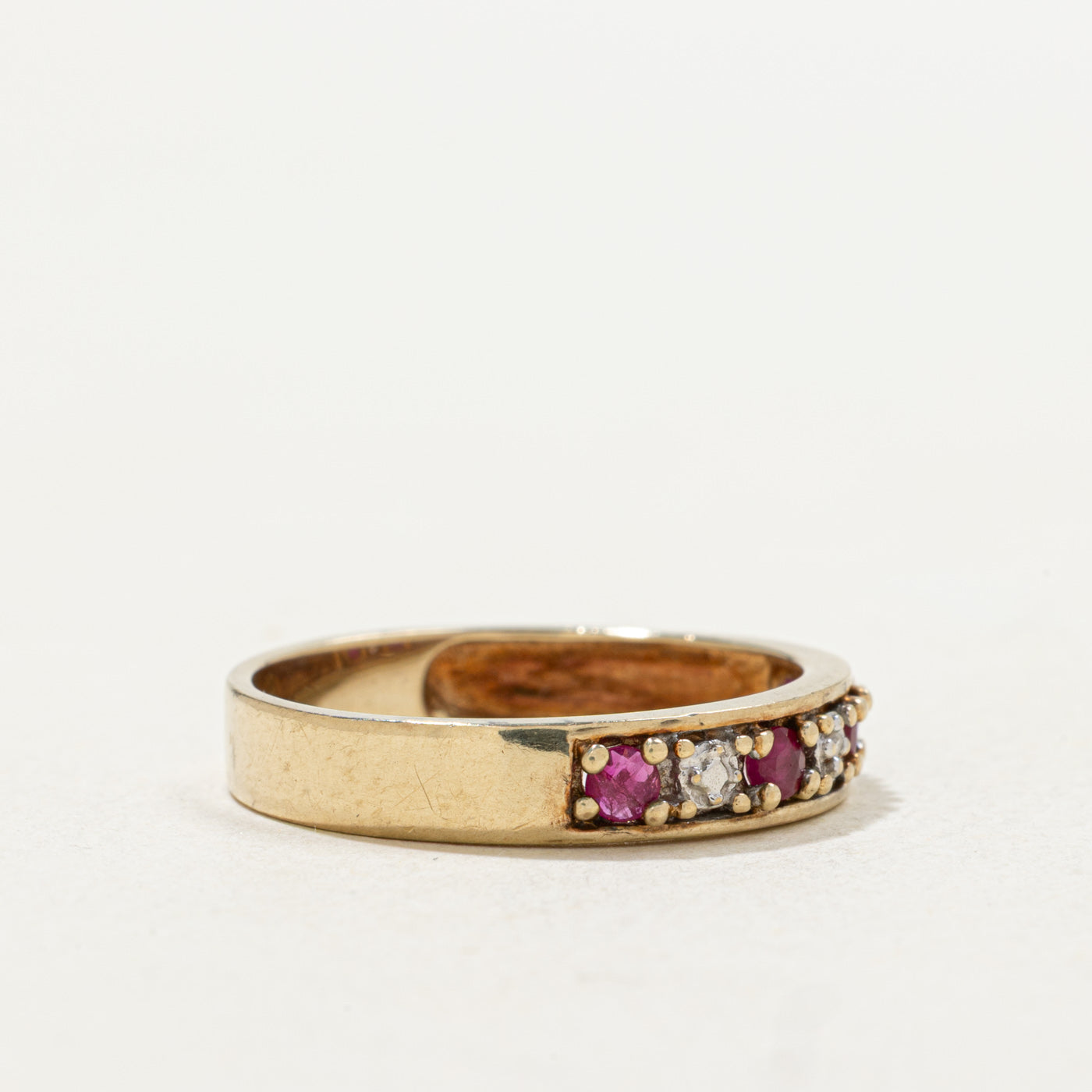 10k Seven Stone Round Cut Ruby & Diamond Band | SZ 7.0