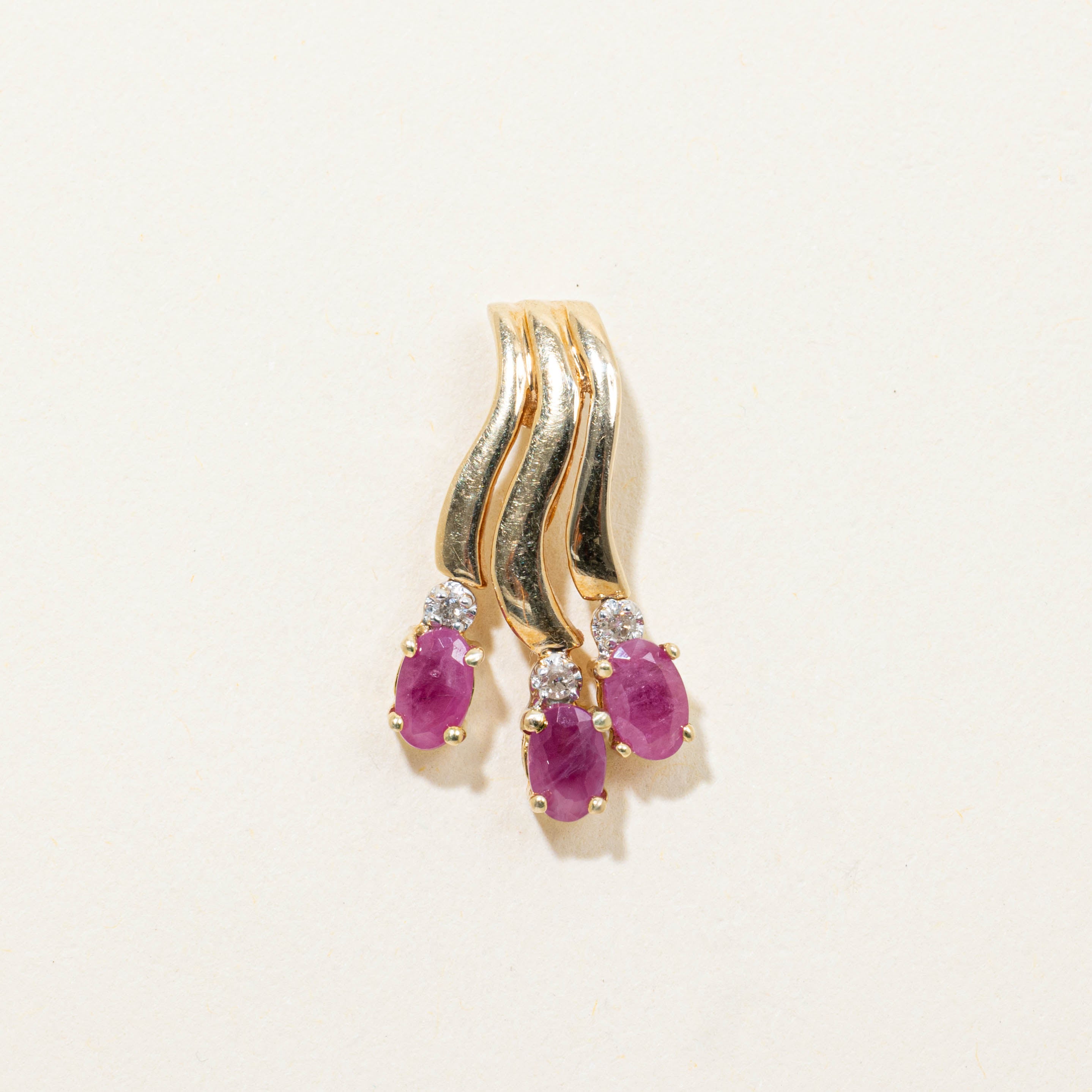 14k Ruby & Diamond Accented Wave Pendant | 0.75ctw, 0.03ctw