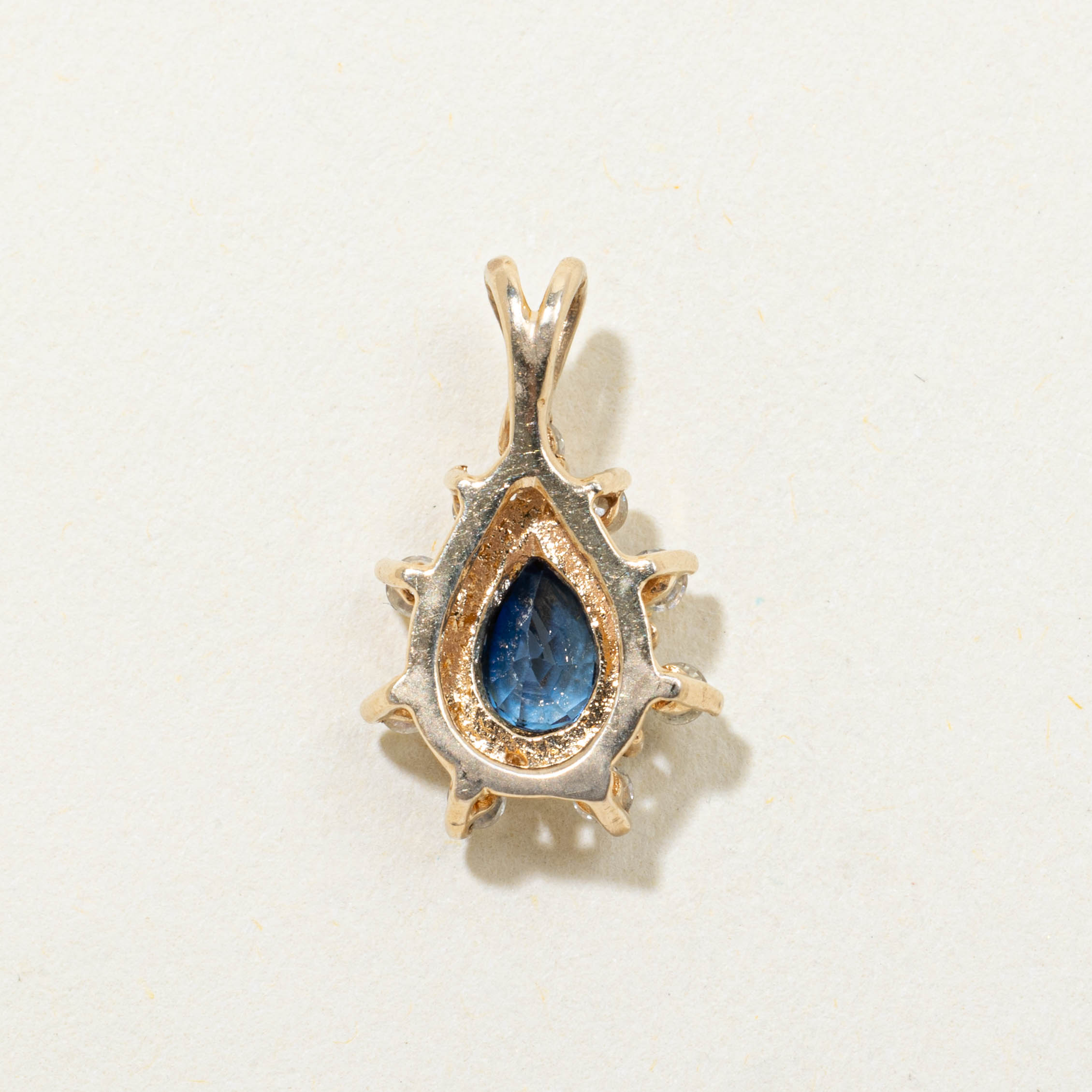 14k Sapphire & Diamond Petal Halo Pendant | 0.60ct, 0.10ctw