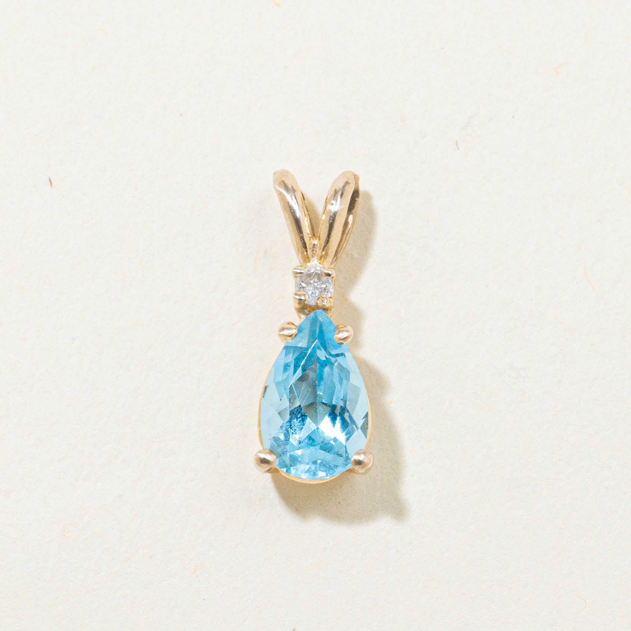 14k Pear Cut Blue Topaz & Diamond Accented Pendant | 0.80ct, 0.01ctw