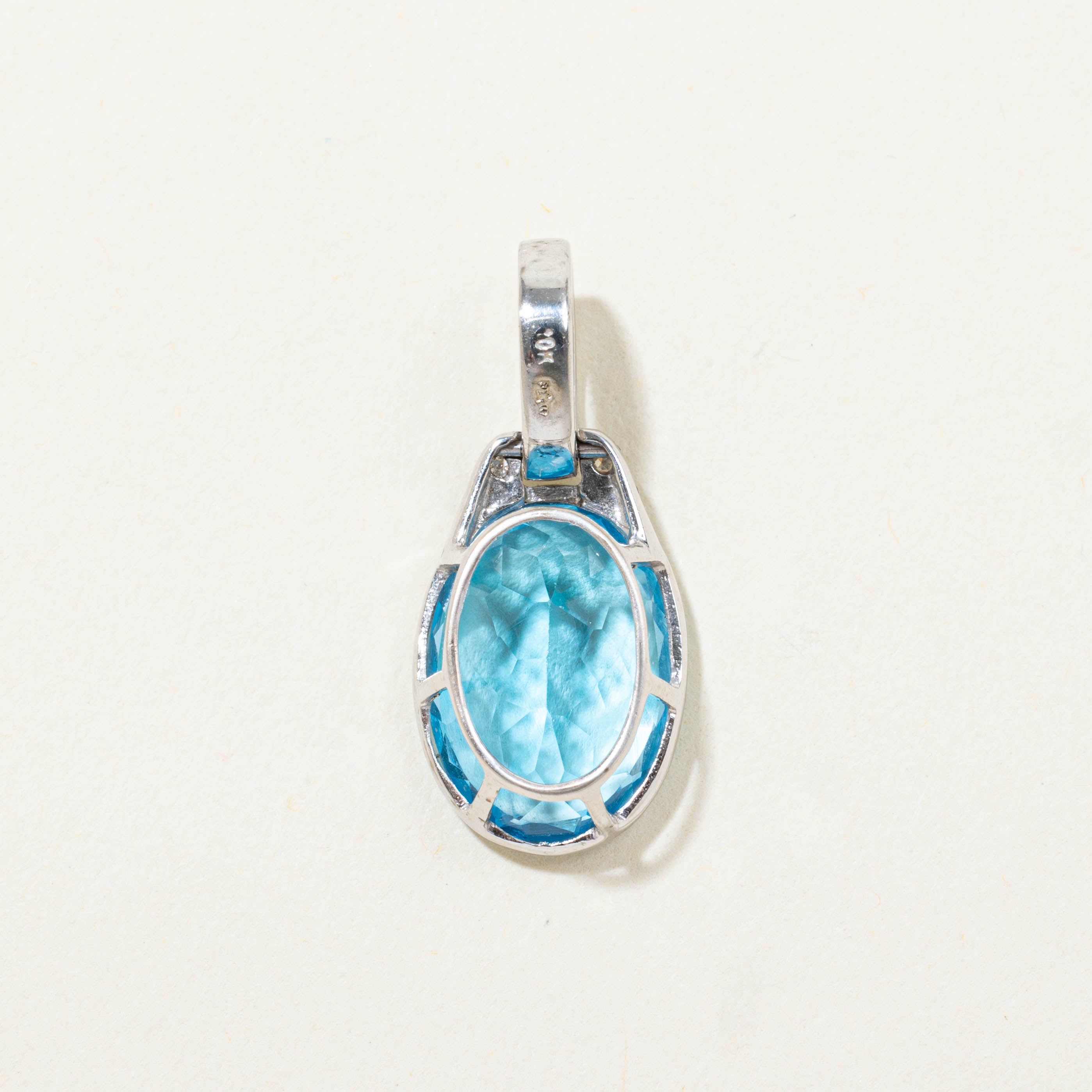 10k Bezel Set Blue Topaz & Diamond Pendant | 6.50ct, 0.04ctw