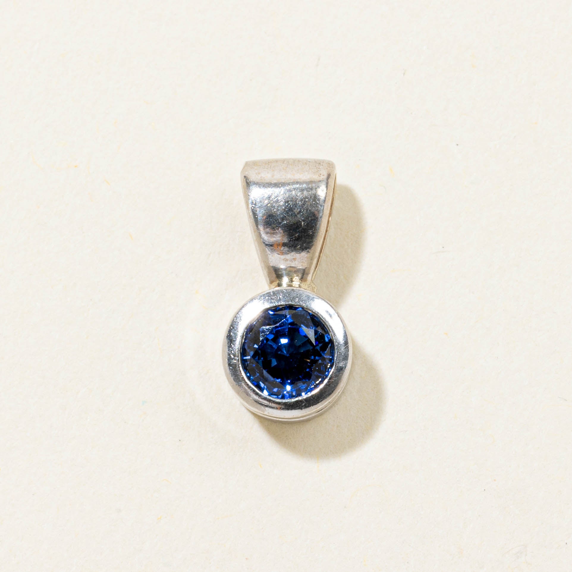 14k Synthetic Sapphire Bezel Set Pendant | 0.60ct