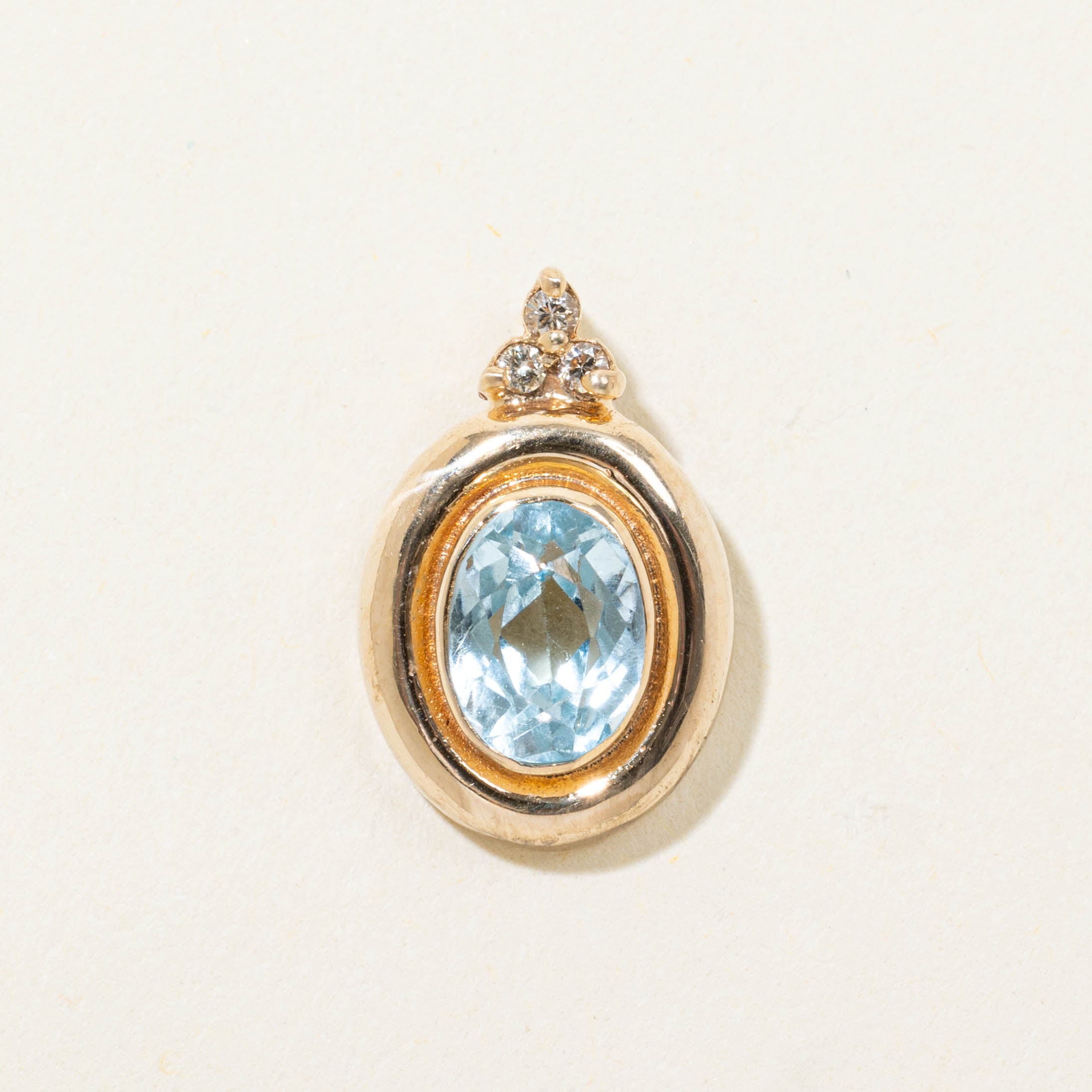 14k Bezel Set Blue Topaz & Diamond Pendant | 1.50ct, 0.05ctw