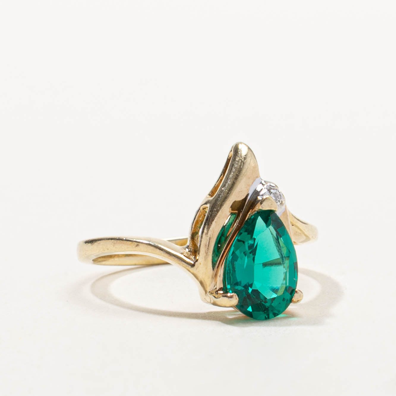 10k Pear Cut Synthetic Emerald & Diamond Accented Ring | 1.15ct, 0.01ctw | SZ 6.75