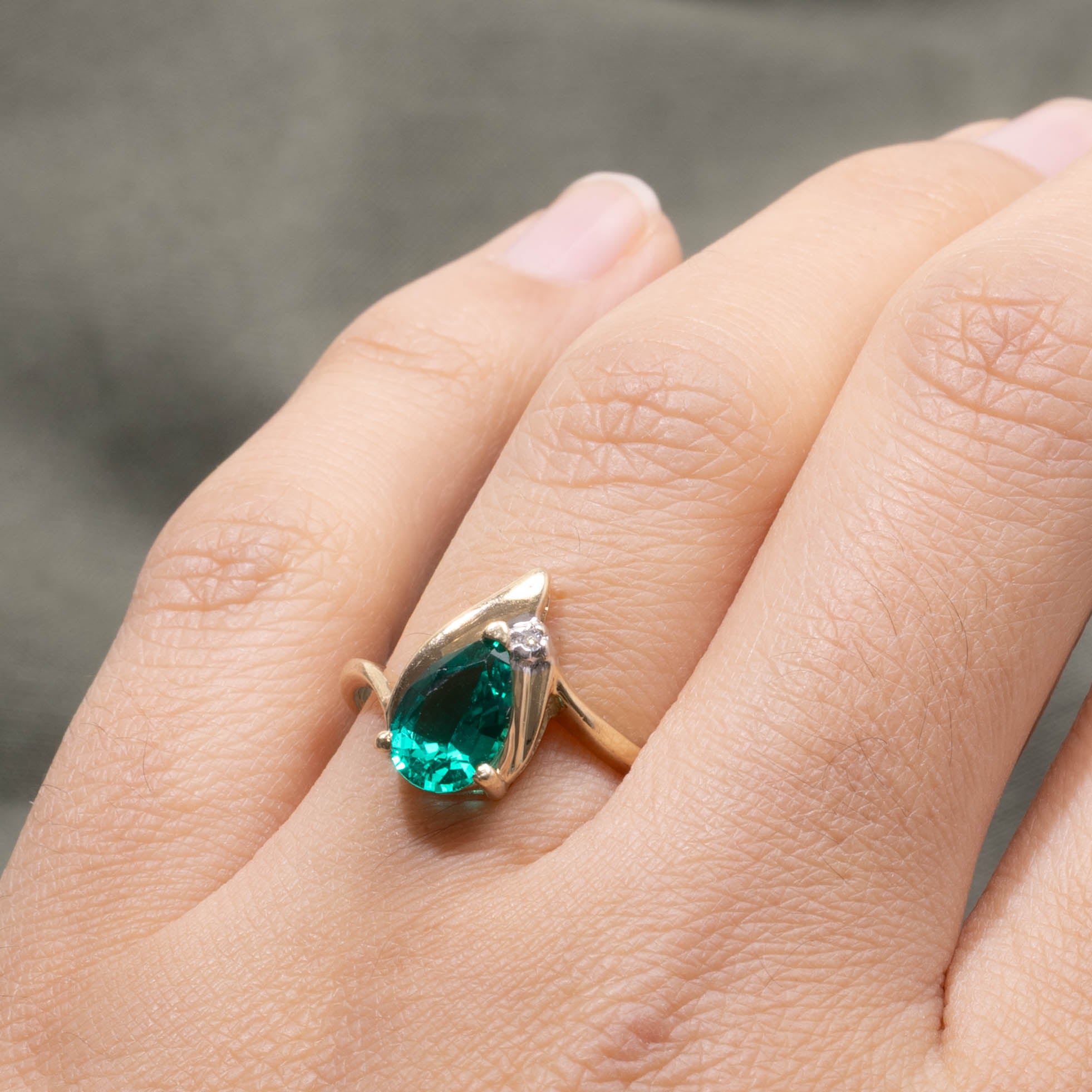 10k Pear Cut Synthetic Emerald & Diamond Accented Ring | 1.15ct, 0.01ctw | SZ 6.75