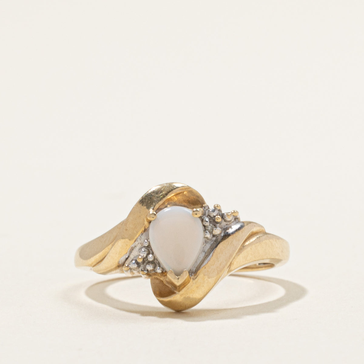 10k Pear Opal & Diamond Grooved Bypass Ring | 0.40ct, 0.004ctw | SZ 7