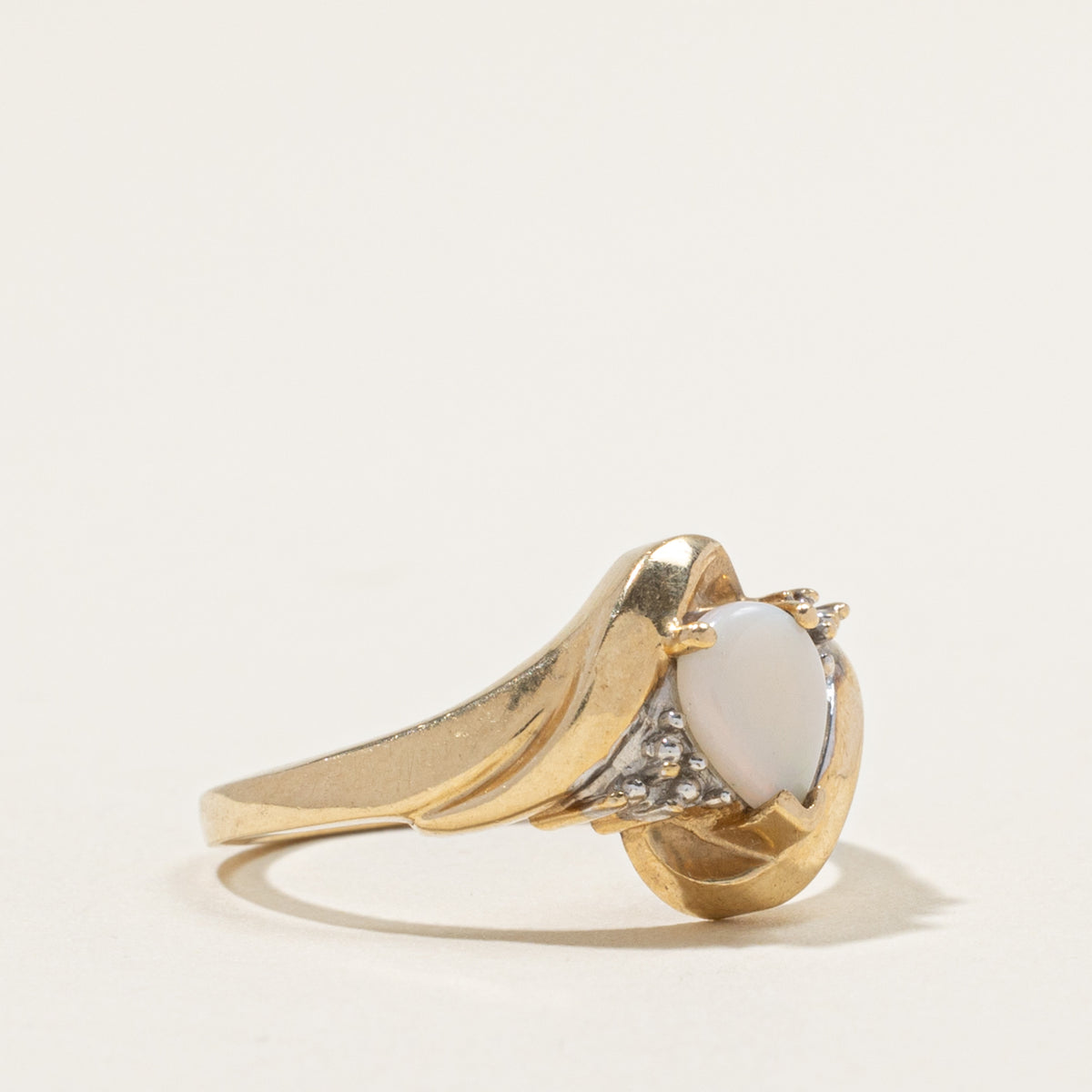 10k Pear Opal & Diamond Grooved Bypass Ring | 0.40ct, 0.004ctw | SZ 7