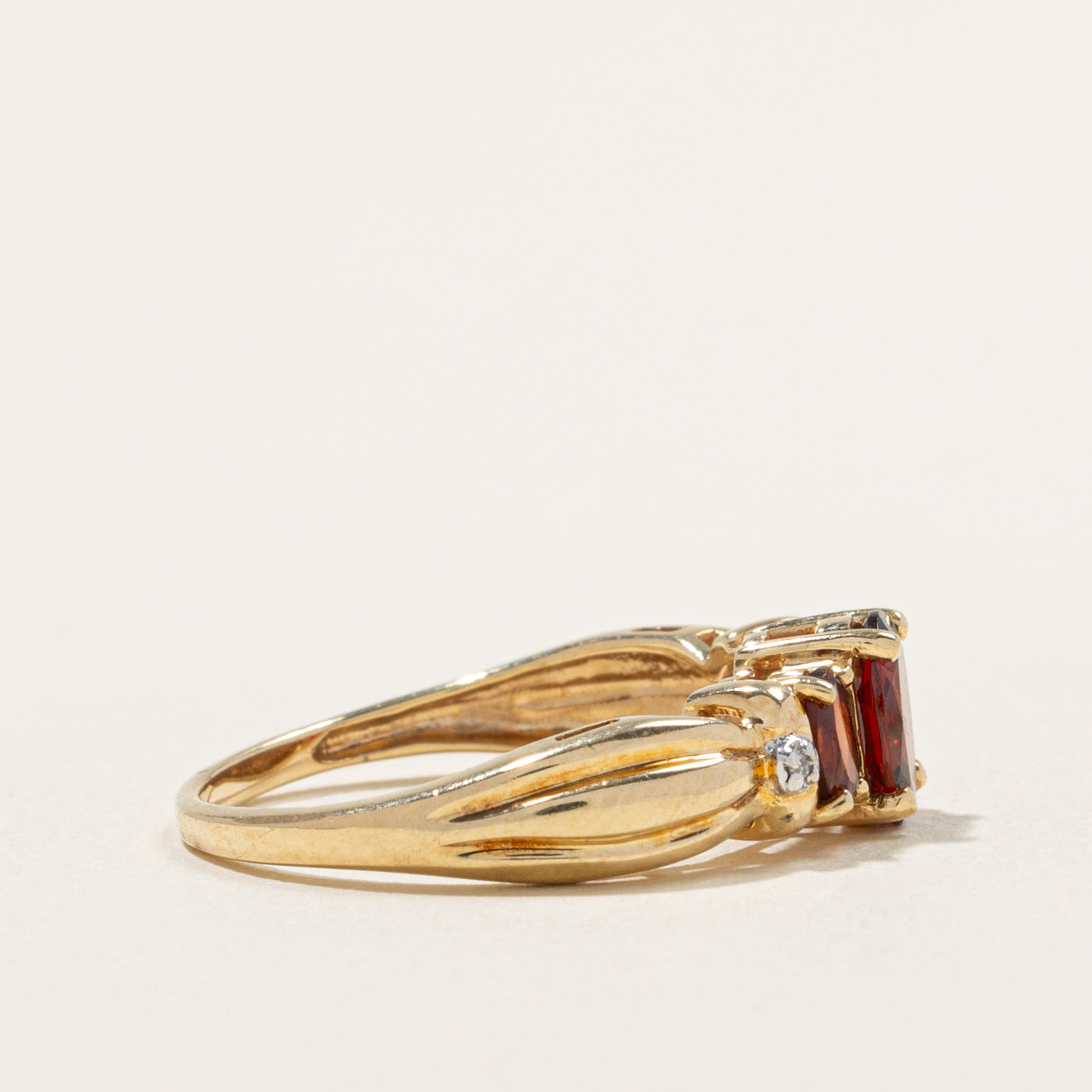 10k Three Stone Garnet & Diamond Accented Grooved Ring | 1.50ctw, 0.01ctw | SZ 8