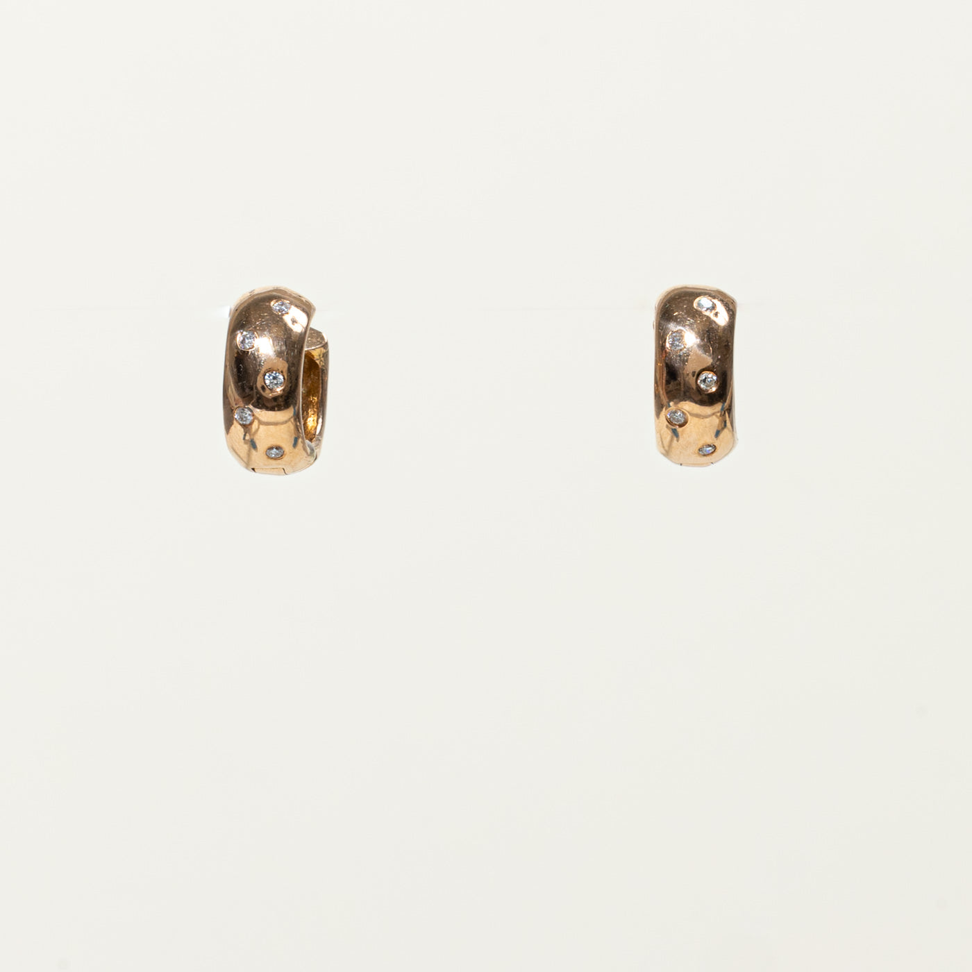 14k Flush Set Diamond Huggie Earrings | 0.06ctw