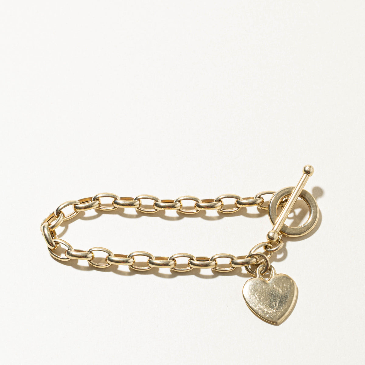 10k Yellow Gold Toggle Clasp Heart Charm Bracelet | 7.5"