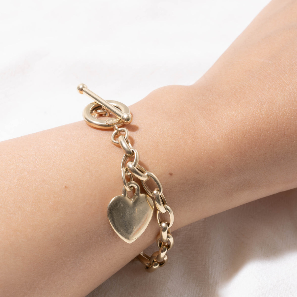 10k Yellow Gold Toggle Clasp Heart Charm Bracelet | 7.5"