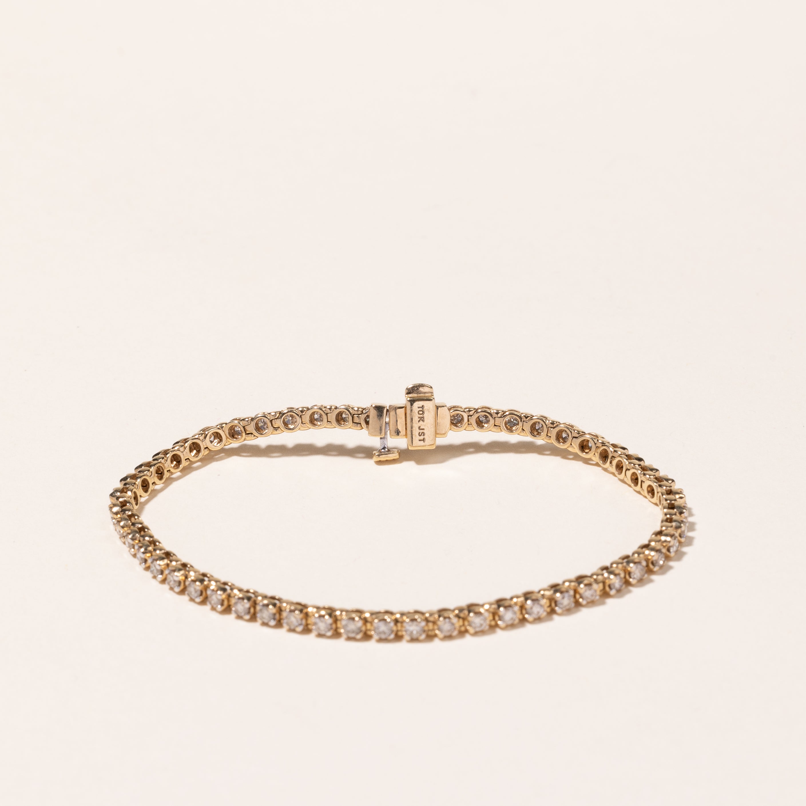 Bracelet tennis en or jaune 10 carats et diamants | 2,08 ct au total | 18,4 cm