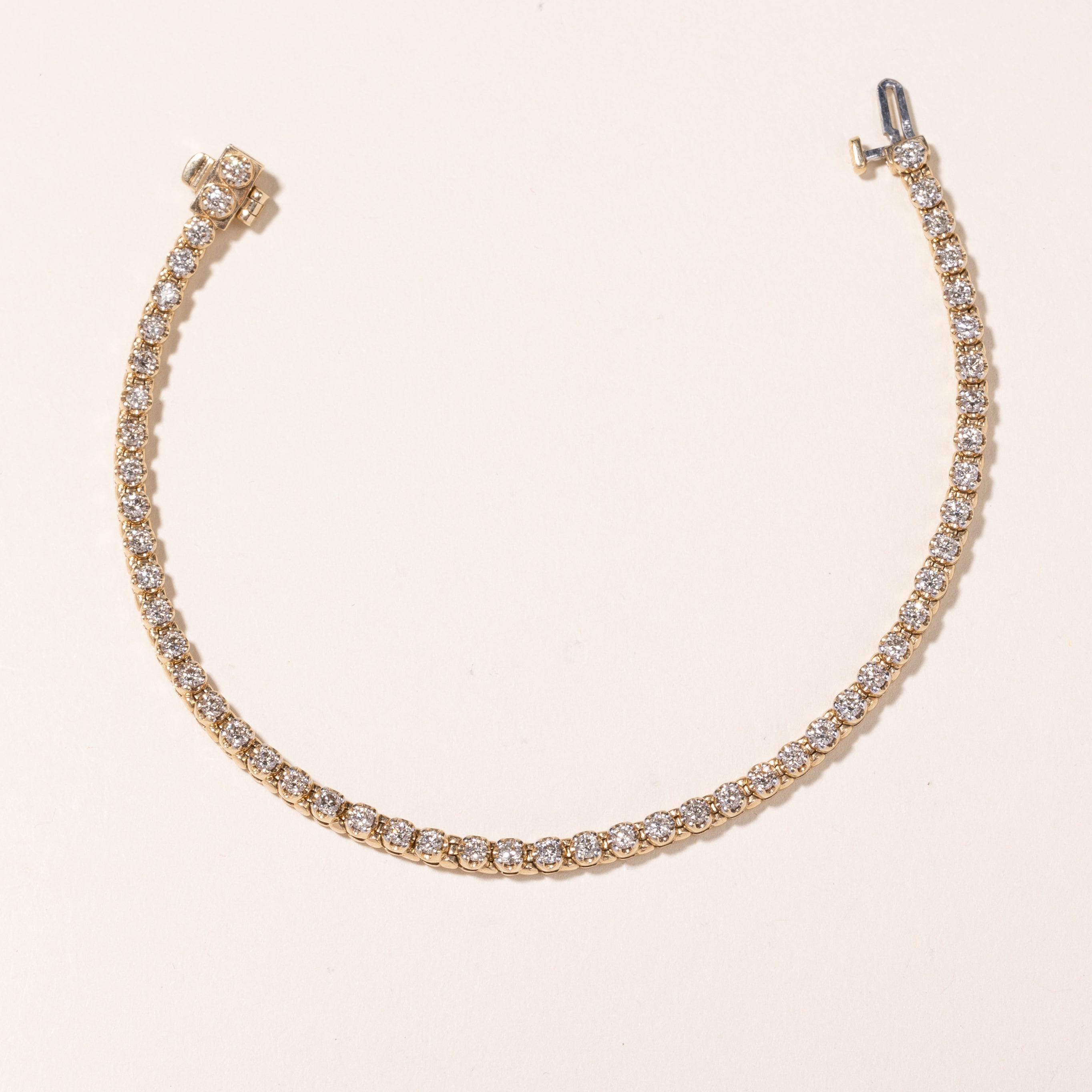 Bracelet tennis en or jaune 10 carats et diamants | 2,08 ct au total | 18,4 cm