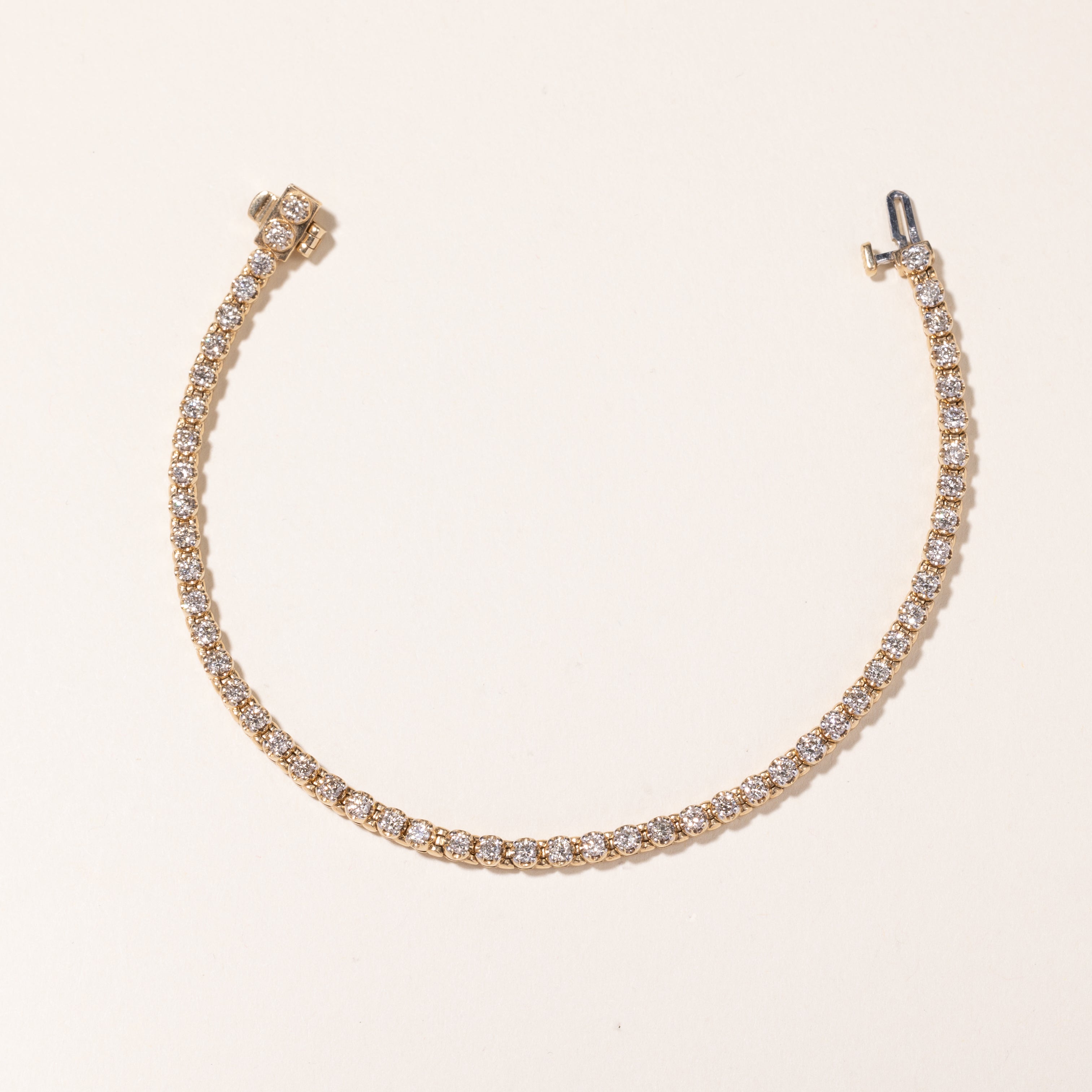 Bracelet tennis en or jaune 10 carats et diamants | 2,08 ct au total | 18,4 cm