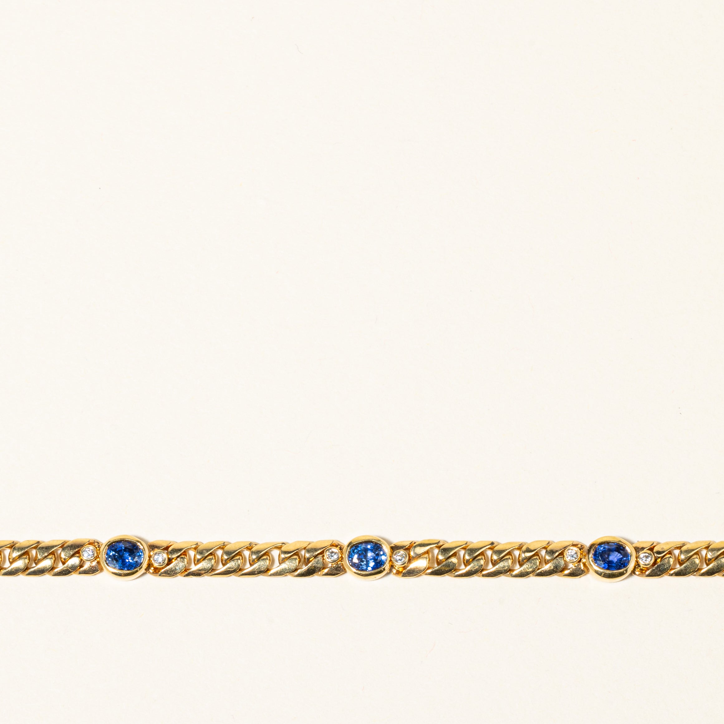 Bracelet en or jaune 18 carats serti de diamants et de saphirs | 0,13 ct au total, 2,58 ct au total | 18,4 cm