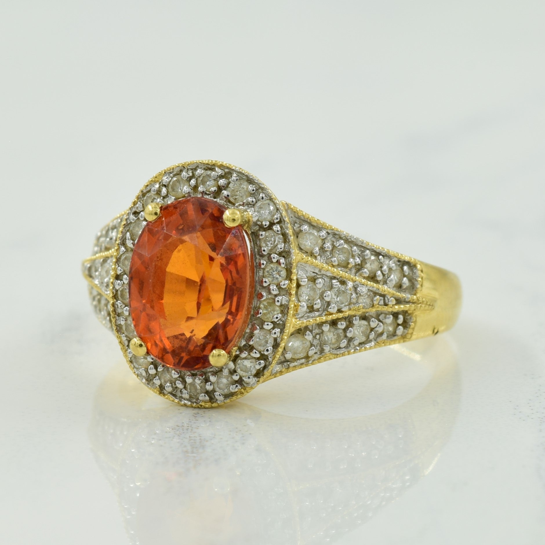 Garnet & Diamond Halo Ring | 1.70ct, 0.30ctw | SZ 7.25 |