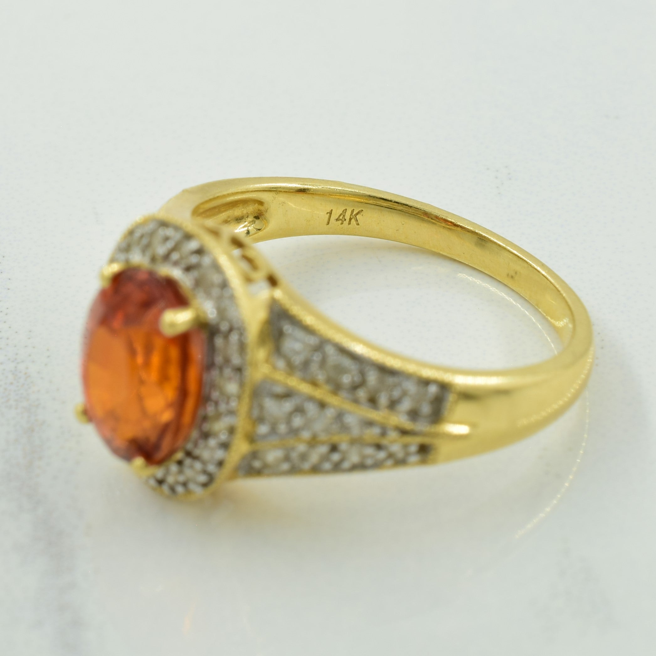 Garnet & Diamond Halo Ring | 1.70ct, 0.30ctw | SZ 7.25 |