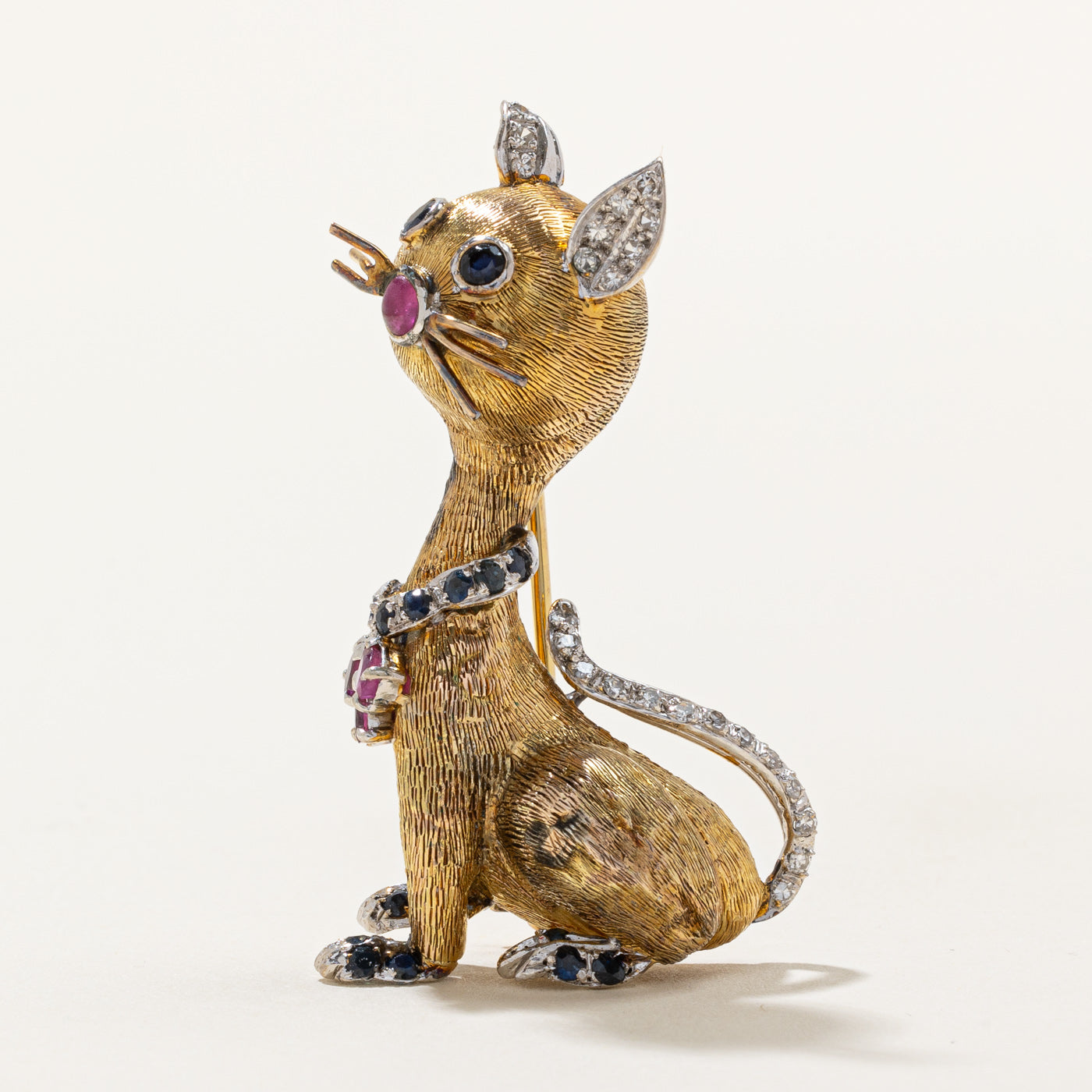 Broche chat vintage en diamants, saphirs et rubis | 1,17 ct |