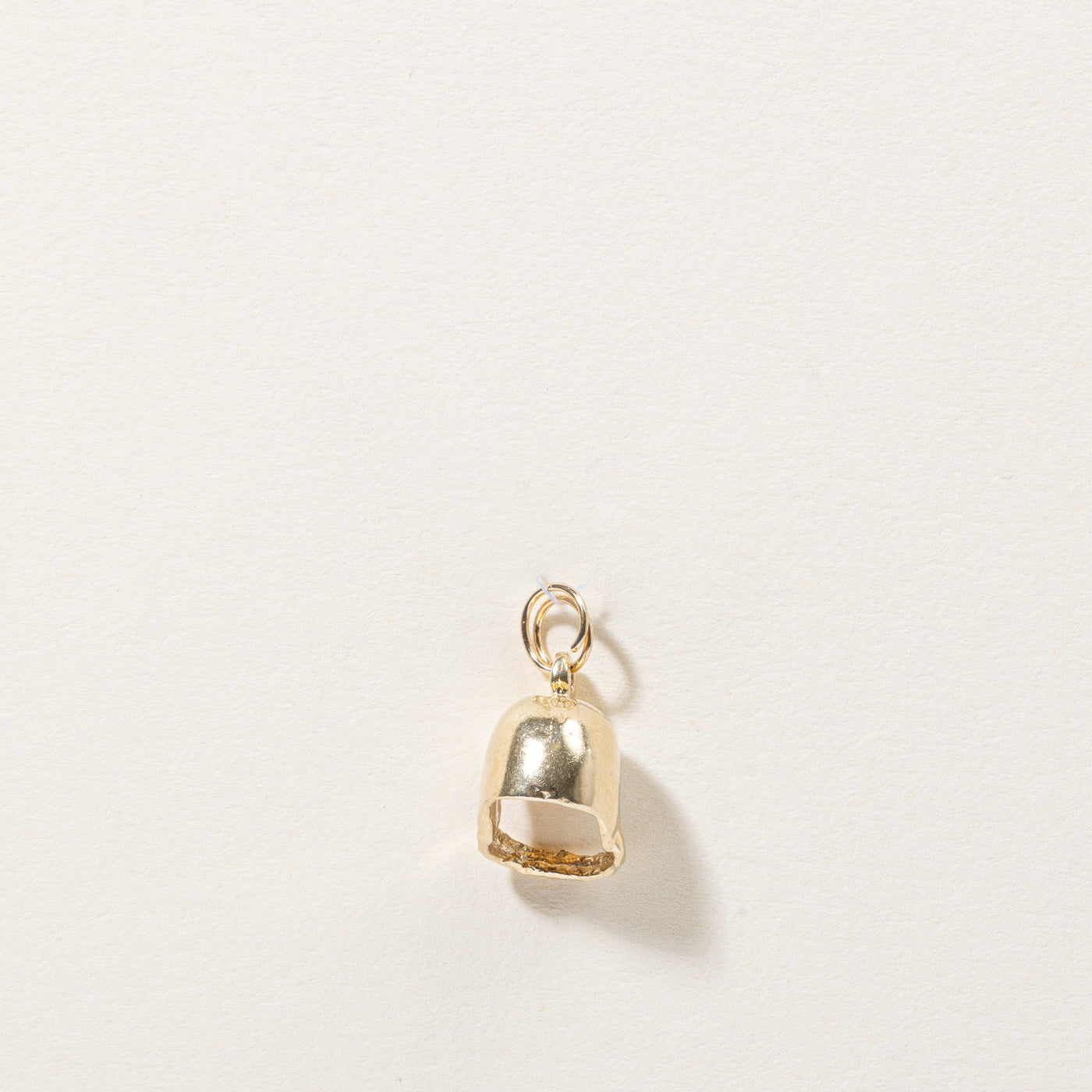 Breloque casque en or jaune 10 carats