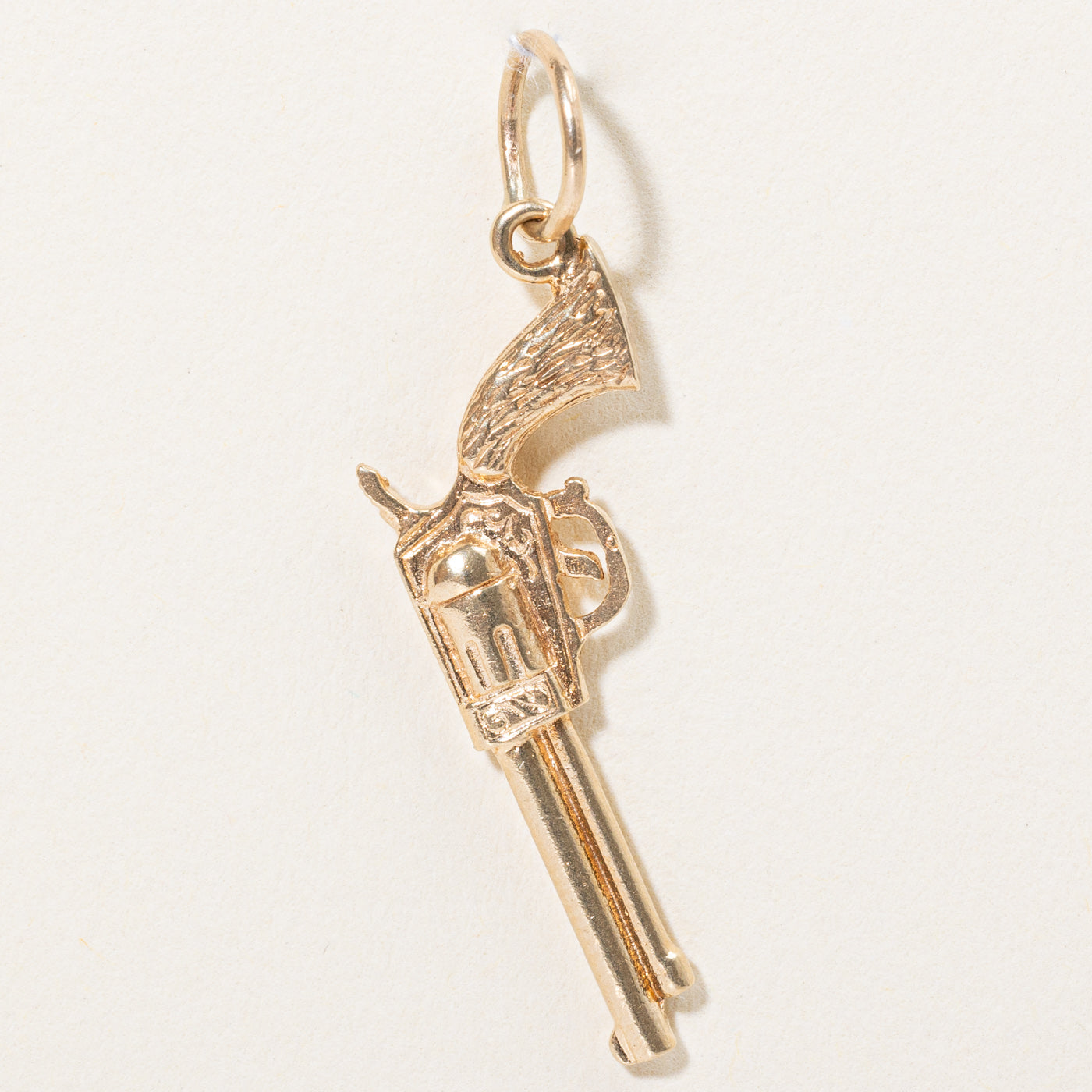 Breloque pistolet western en or jaune 14 carats